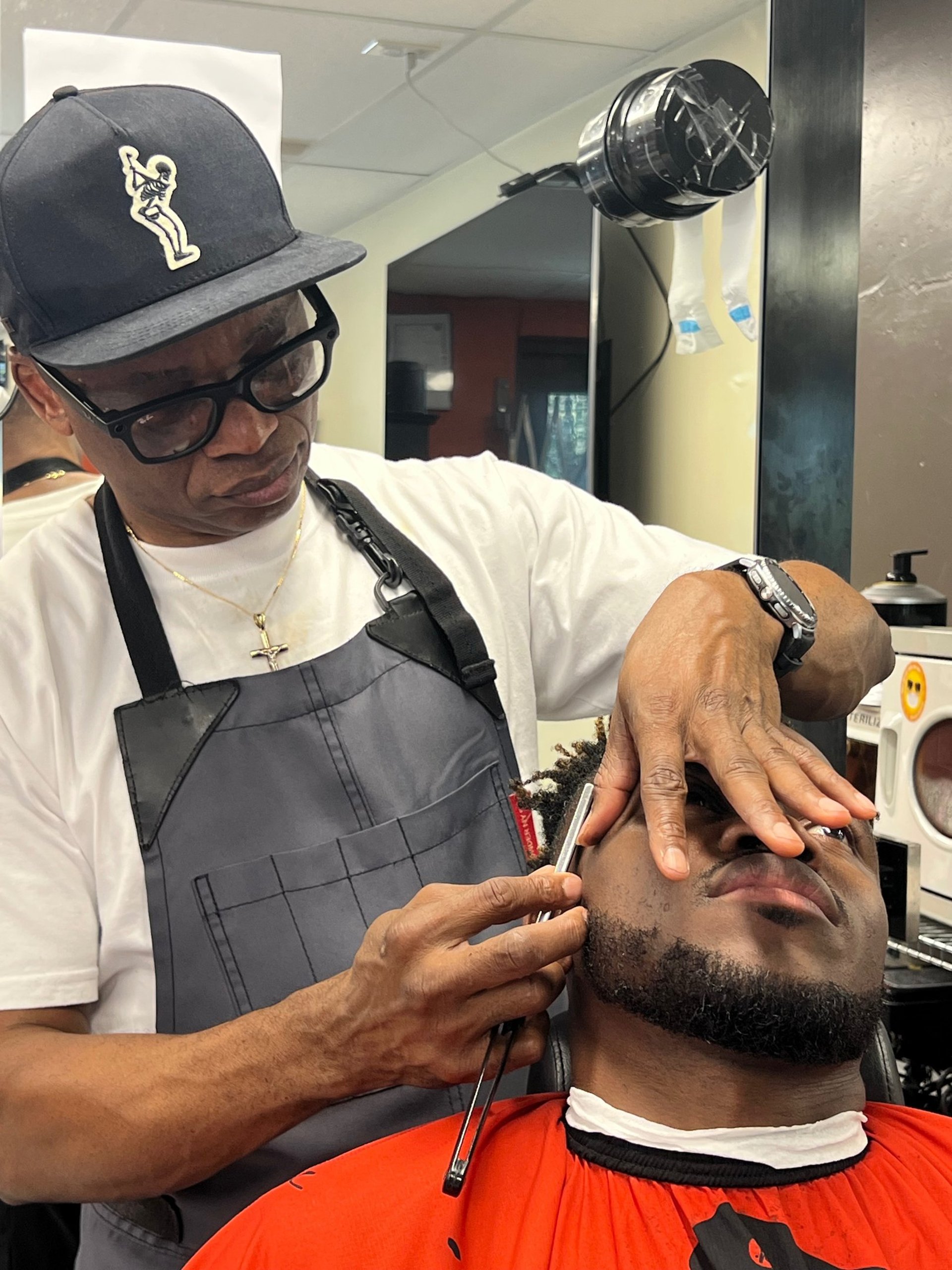 black and brown leather padded tub sofa
