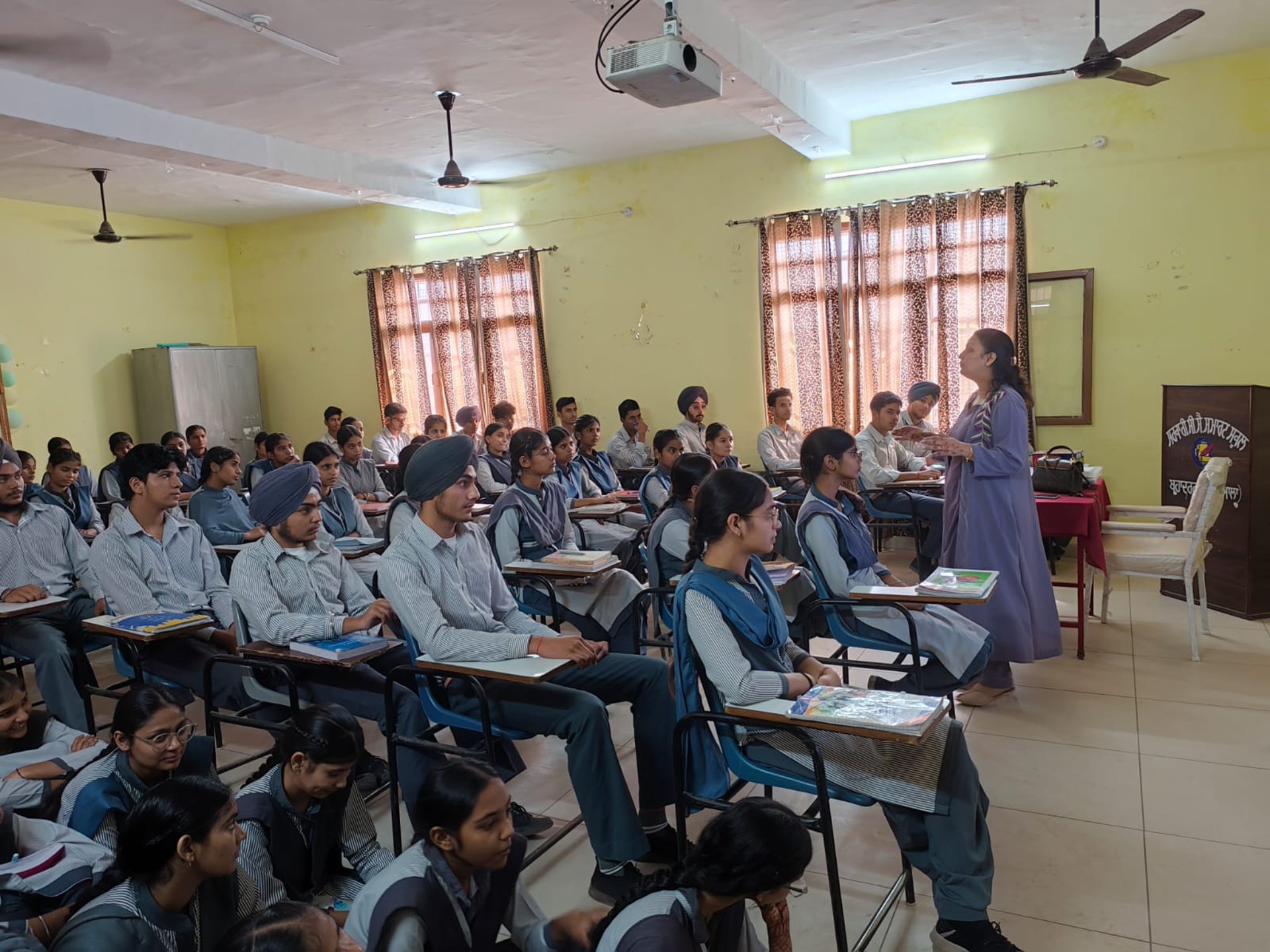 black and brown leather padded tub sofa