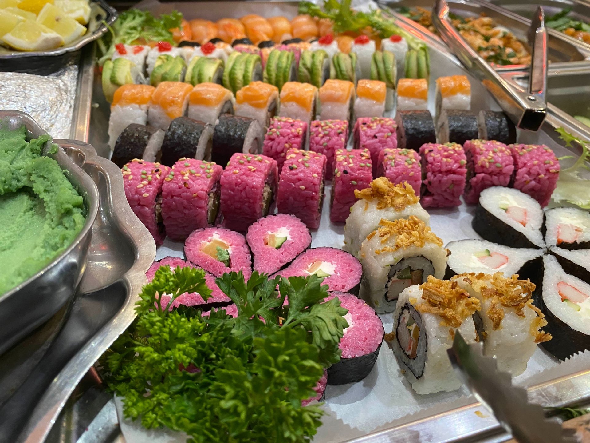 sushi on black ceramic plate