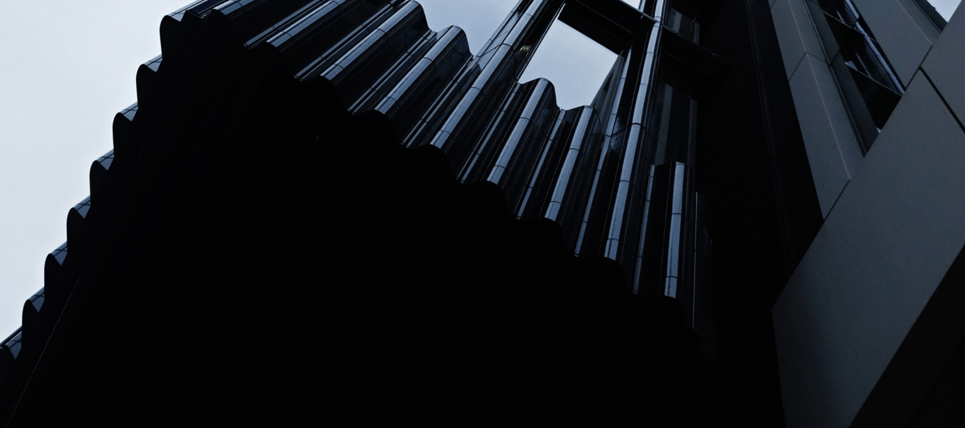 a couple of tall buildings next to each other