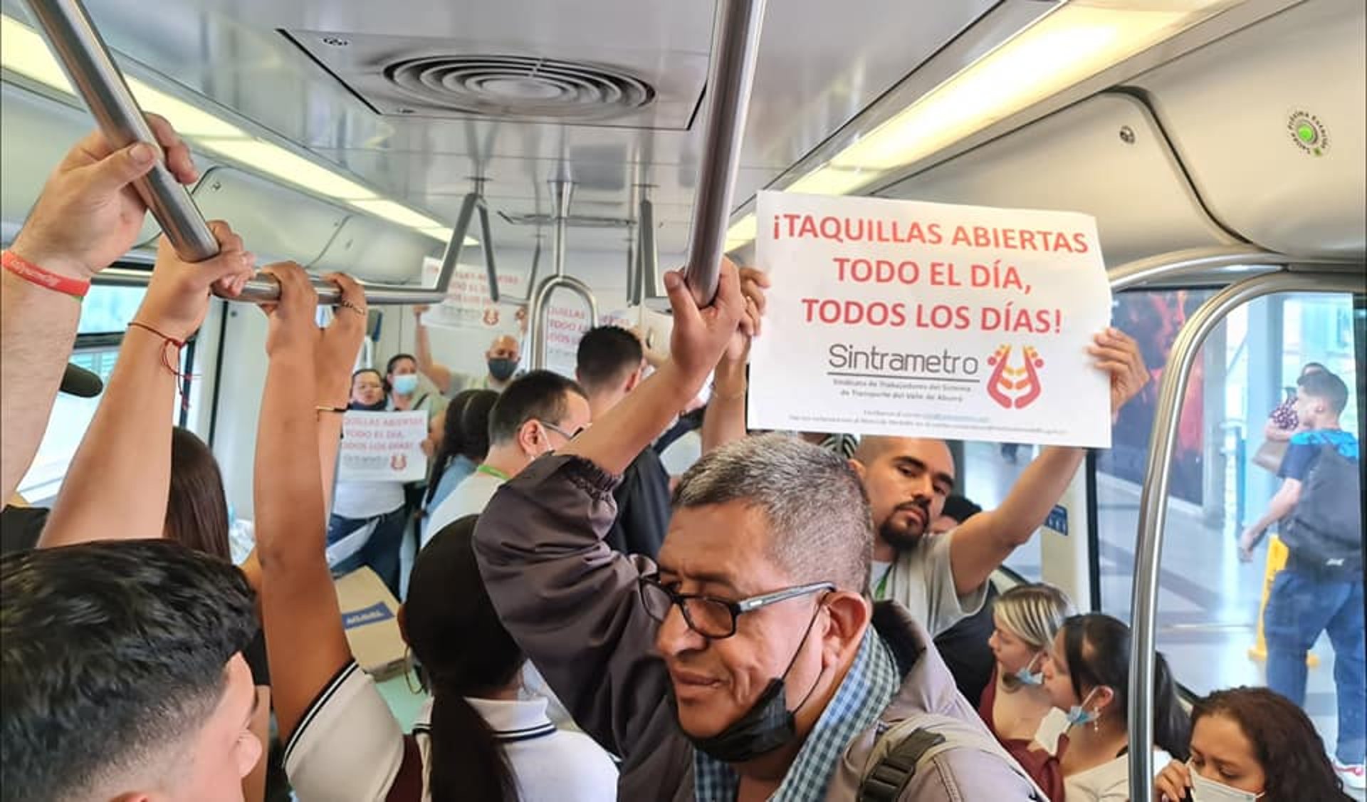 an abstract photo of a curved building with a blue sky in the background