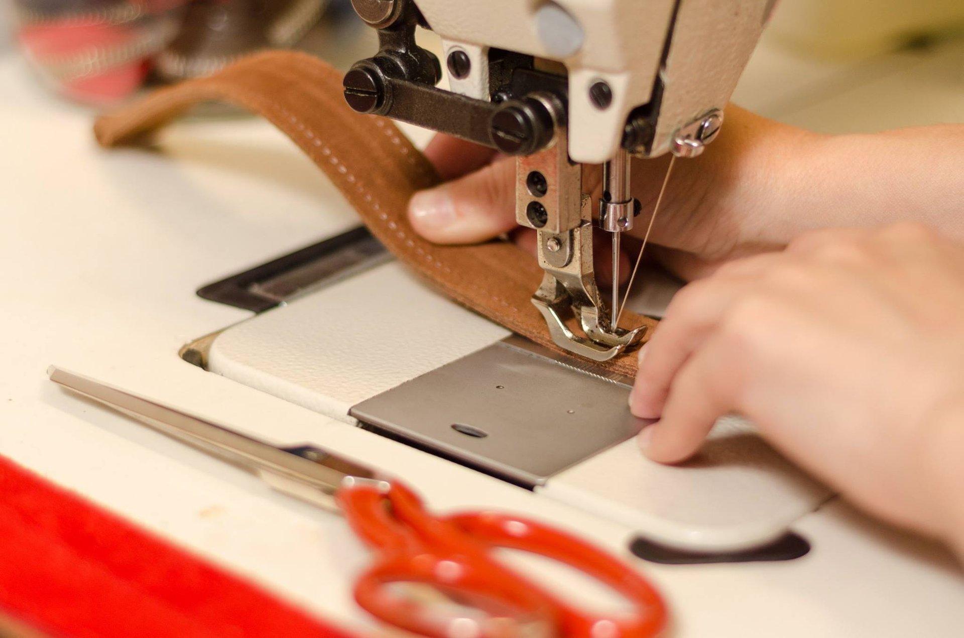 woman wearing yellow long-sleeved dress under white clouds and blue sky during daytime