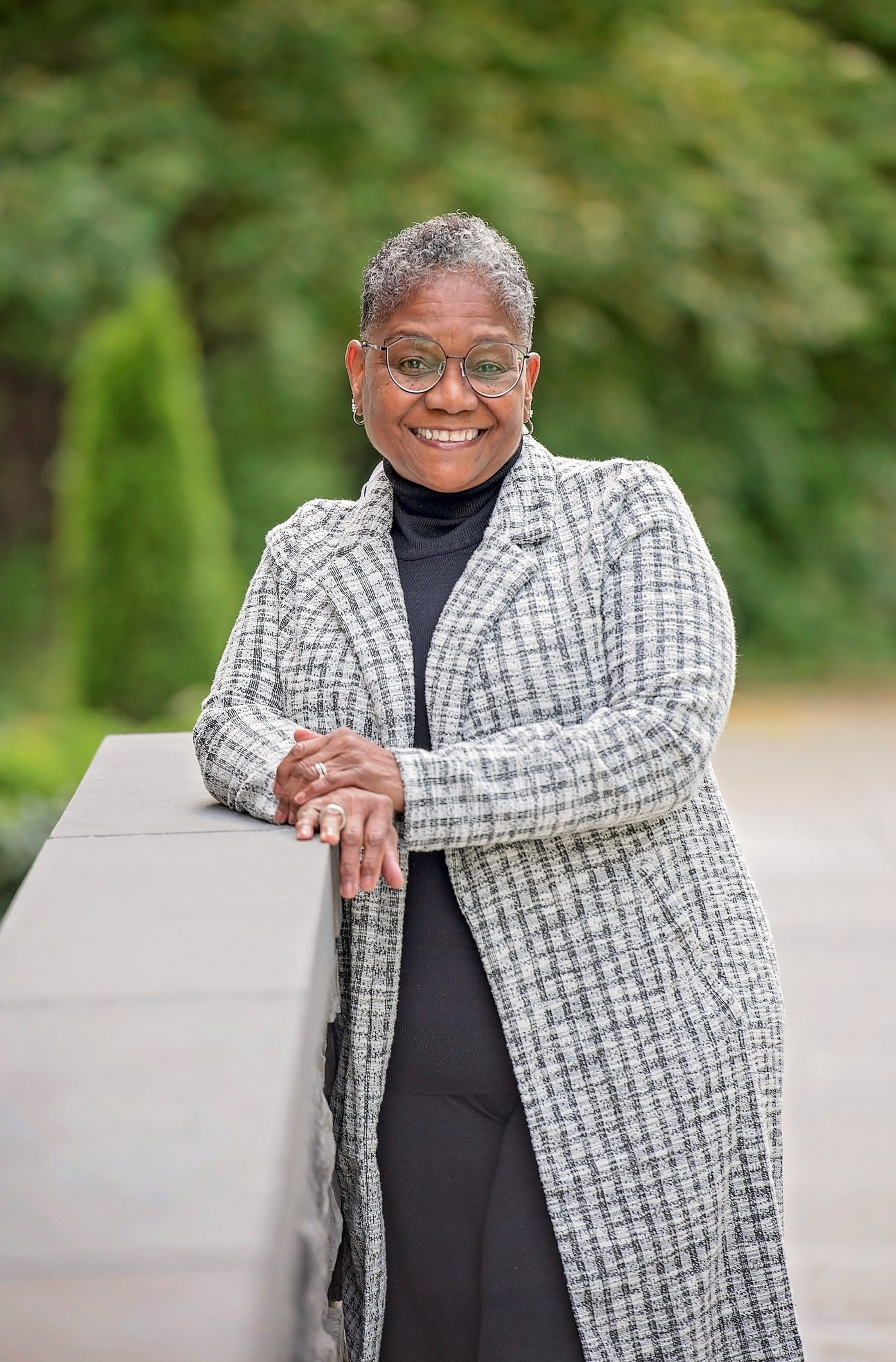 black and brown leather padded tub sofa