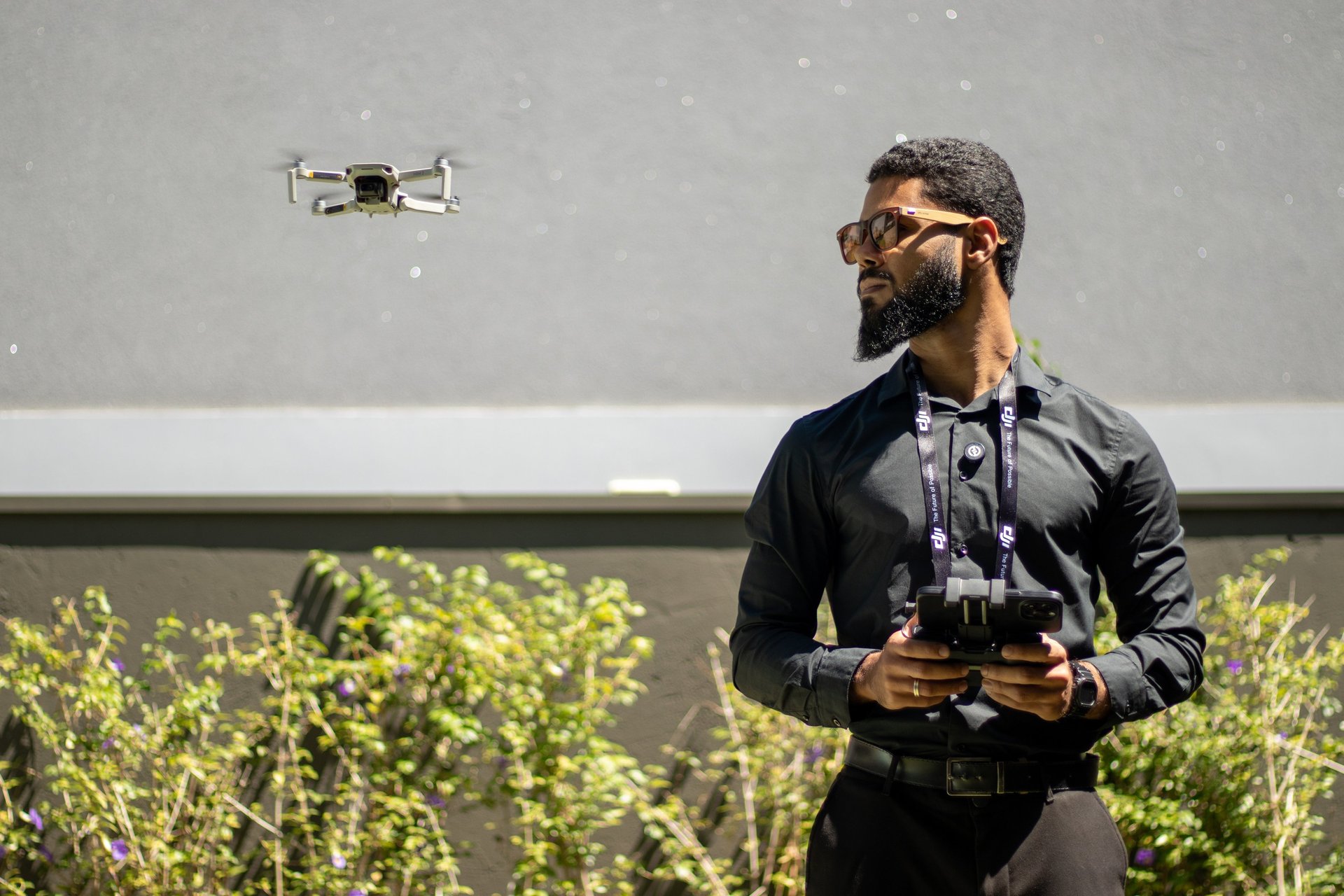 woman wearing yellow long-sleeved dress under white clouds and blue sky during daytime
