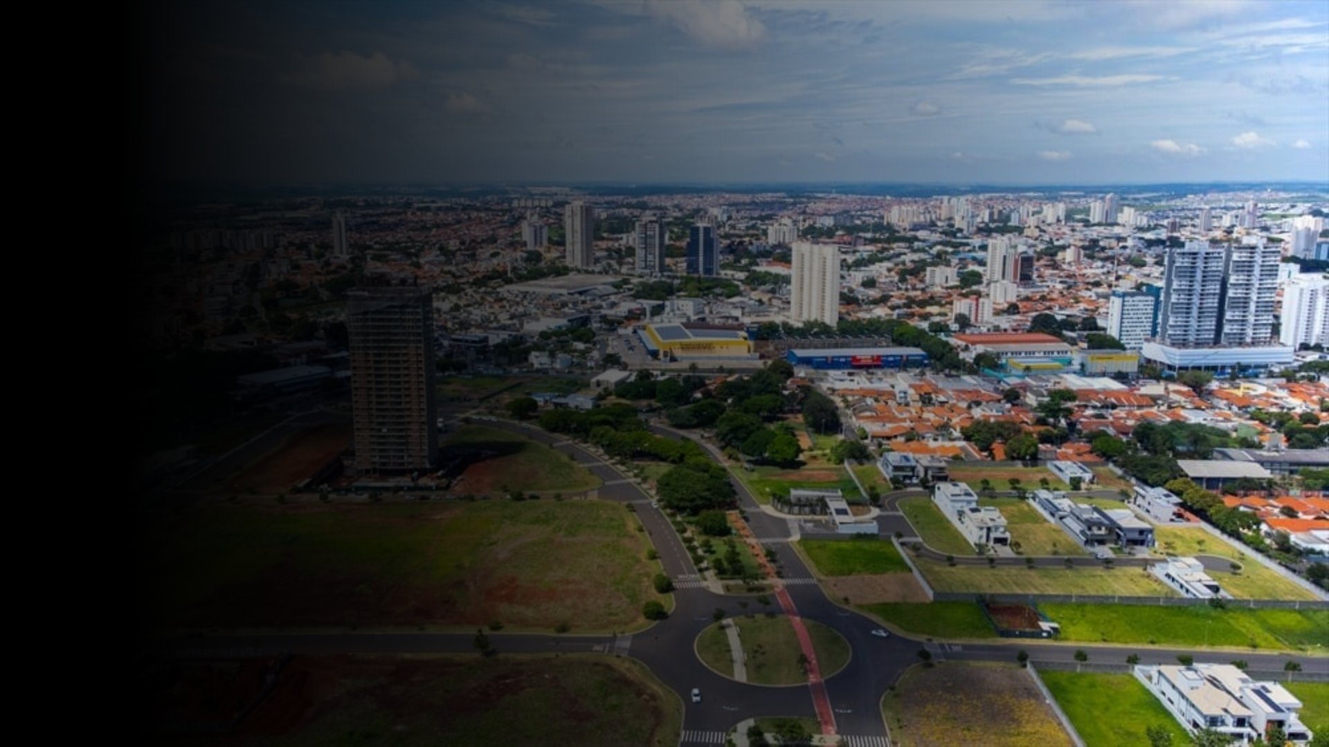 white and red wooden house miniature on brown table