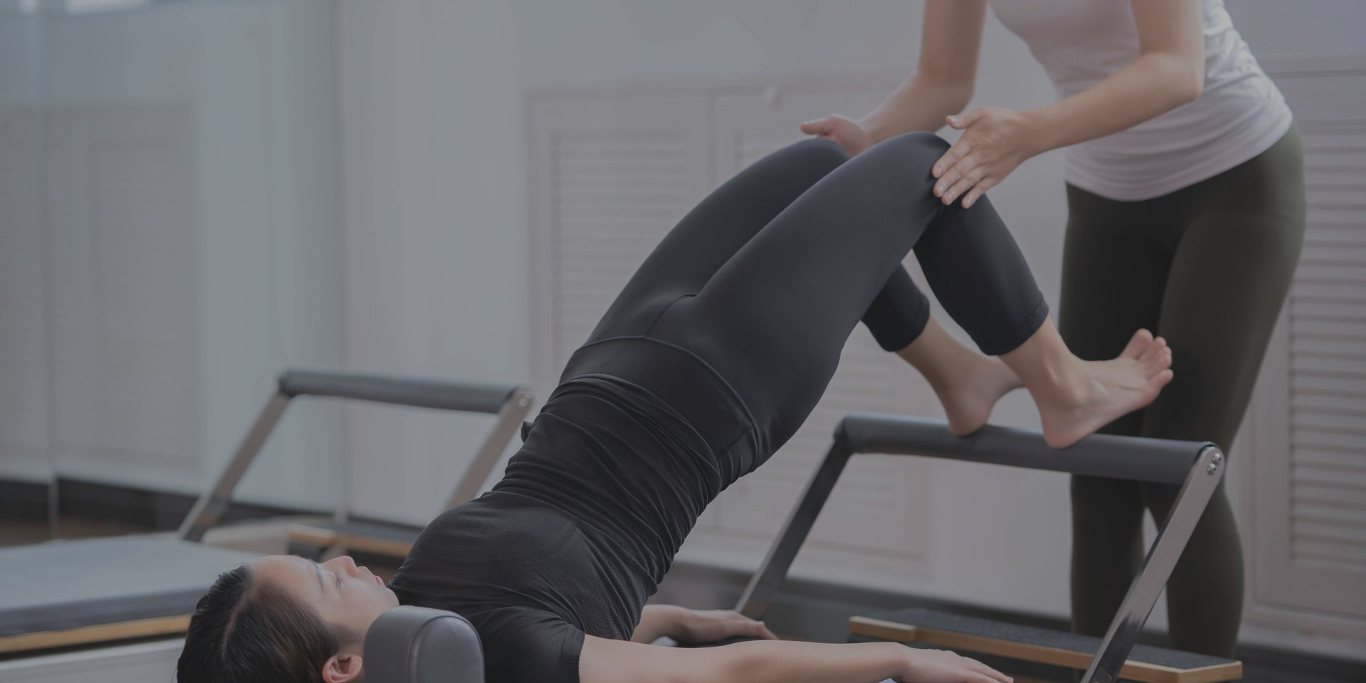 an abstract photo of a curved building with a blue sky in the background