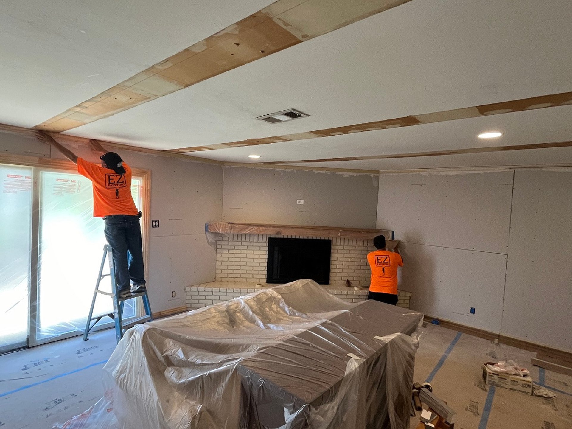an abstract photo of a curved building with a blue sky in the background