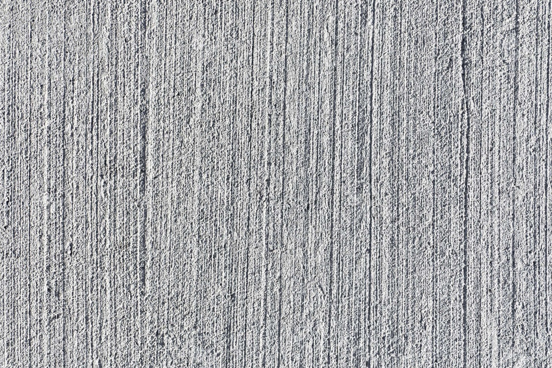 a black and white photo of a concrete wall