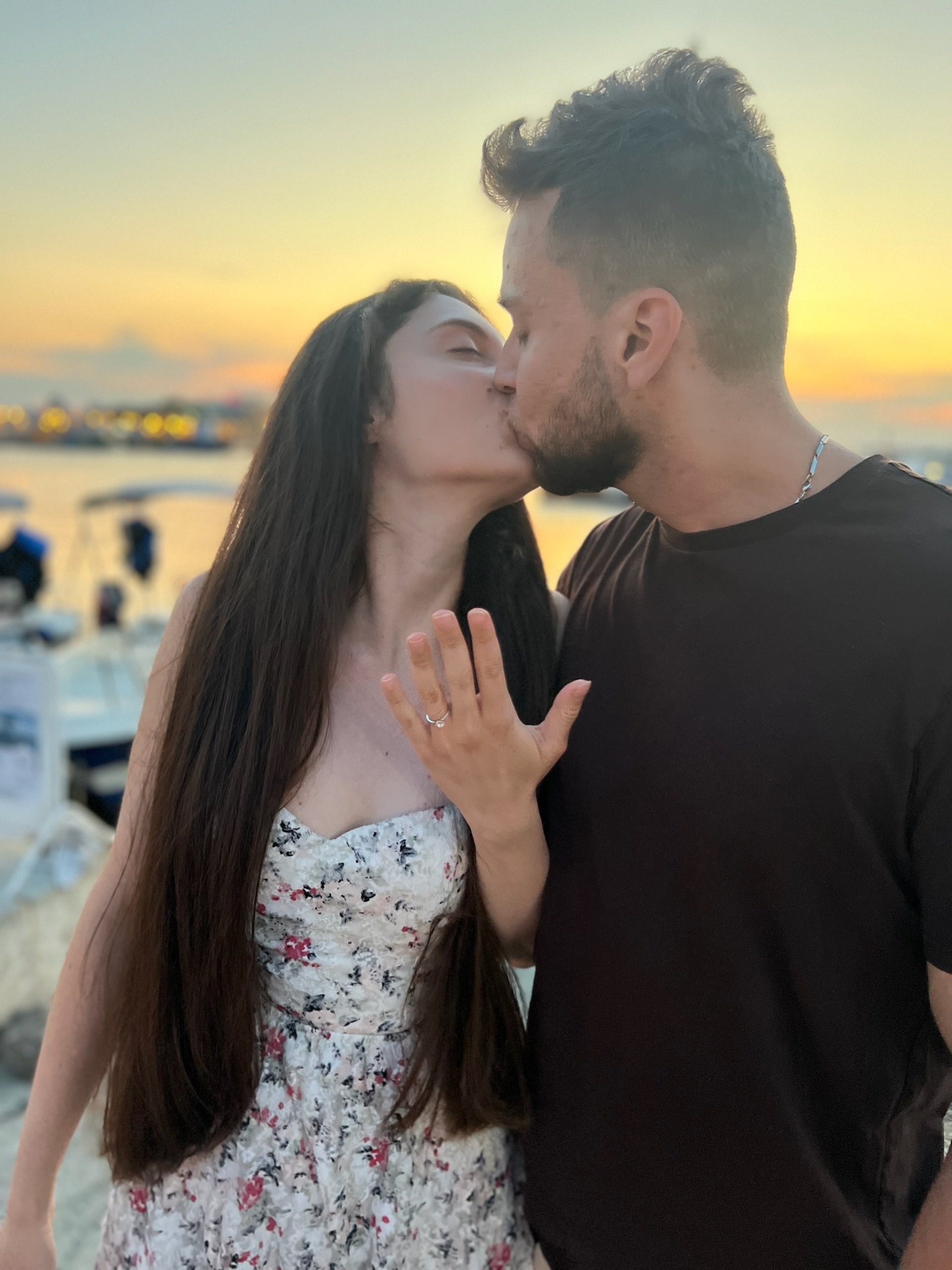 couple wearing silver-colored rings