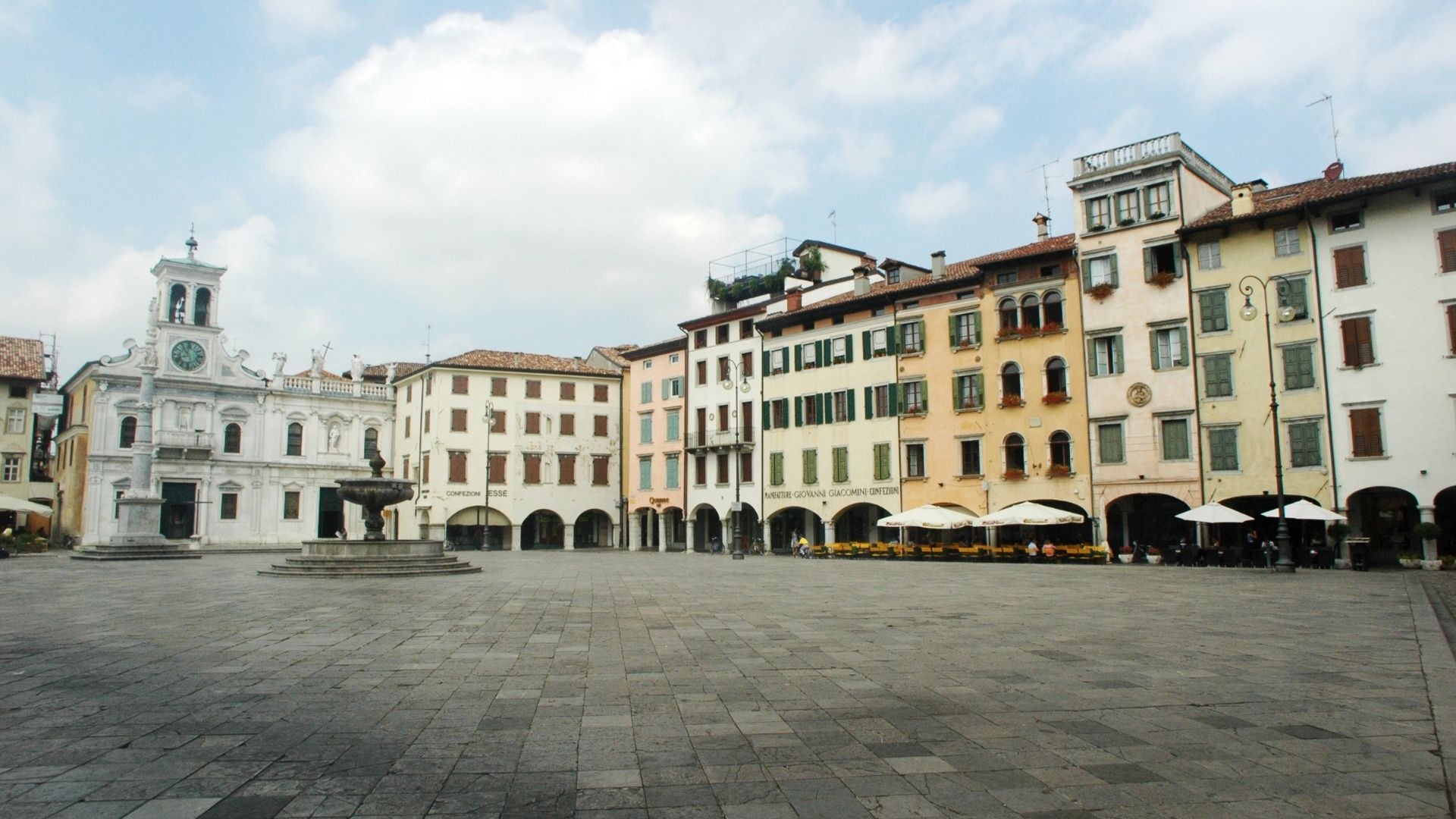 green trees near city buildings during daytime