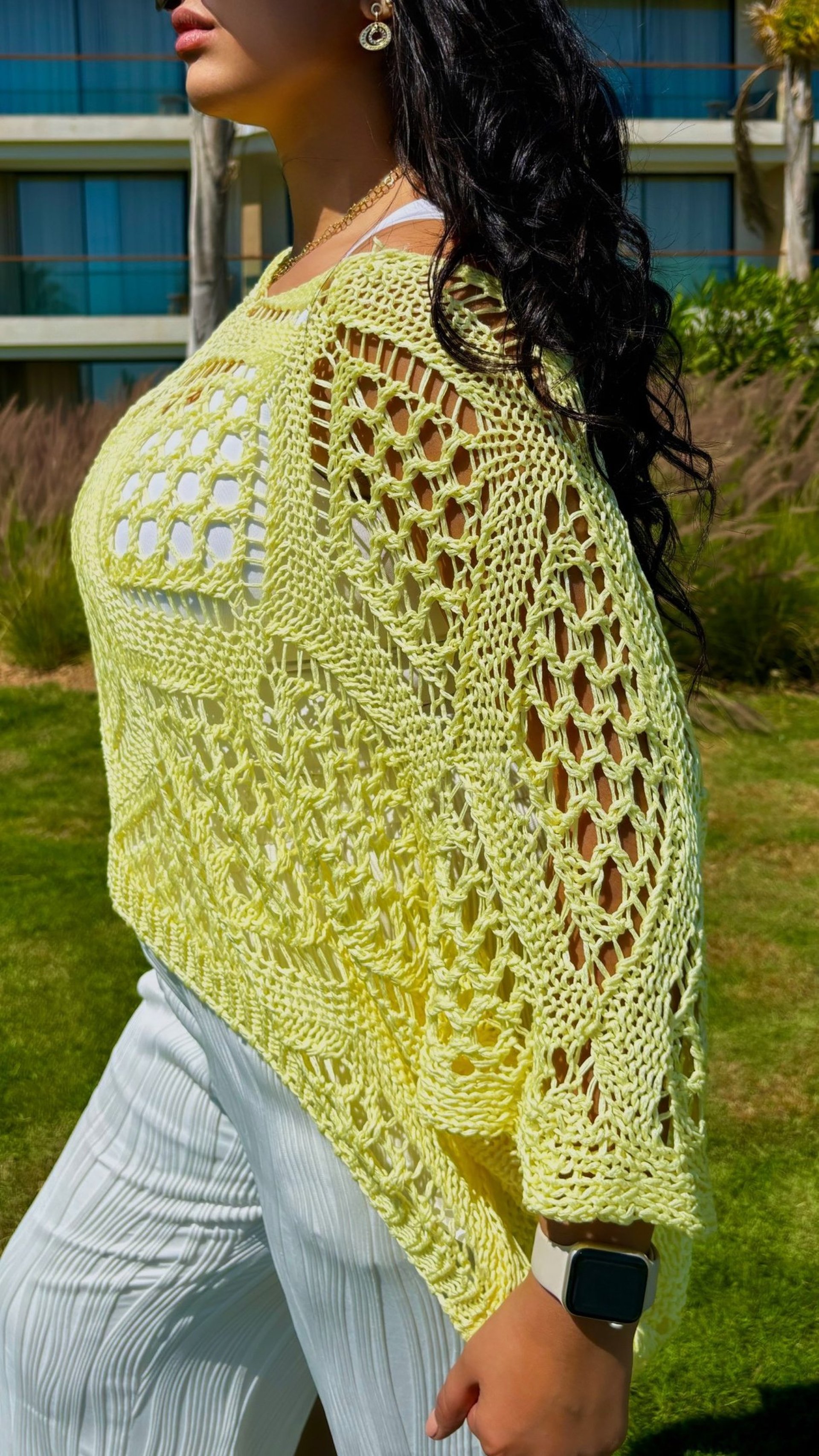 person wearing grey knit sweater