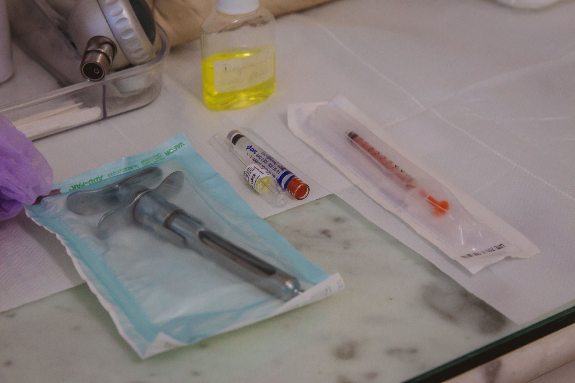 woman wearing yellow long-sleeved dress under white clouds and blue sky during daytime