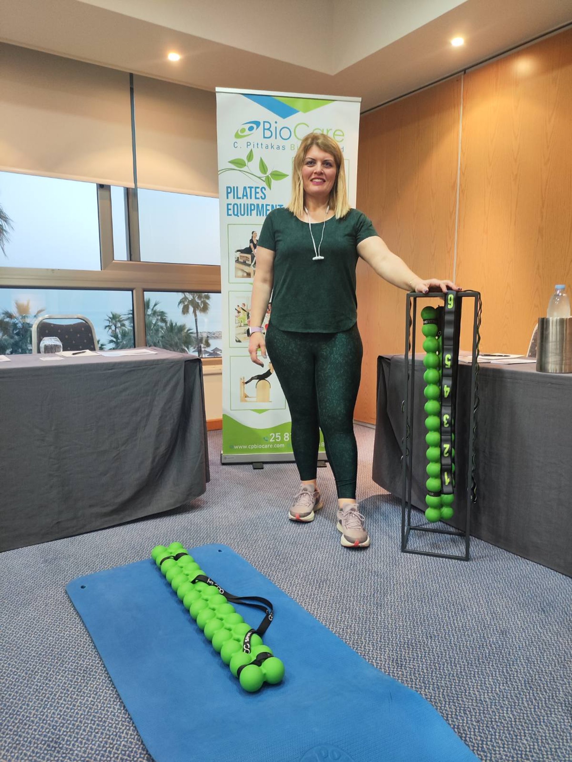 a woman is doing exercises on a rowing machine