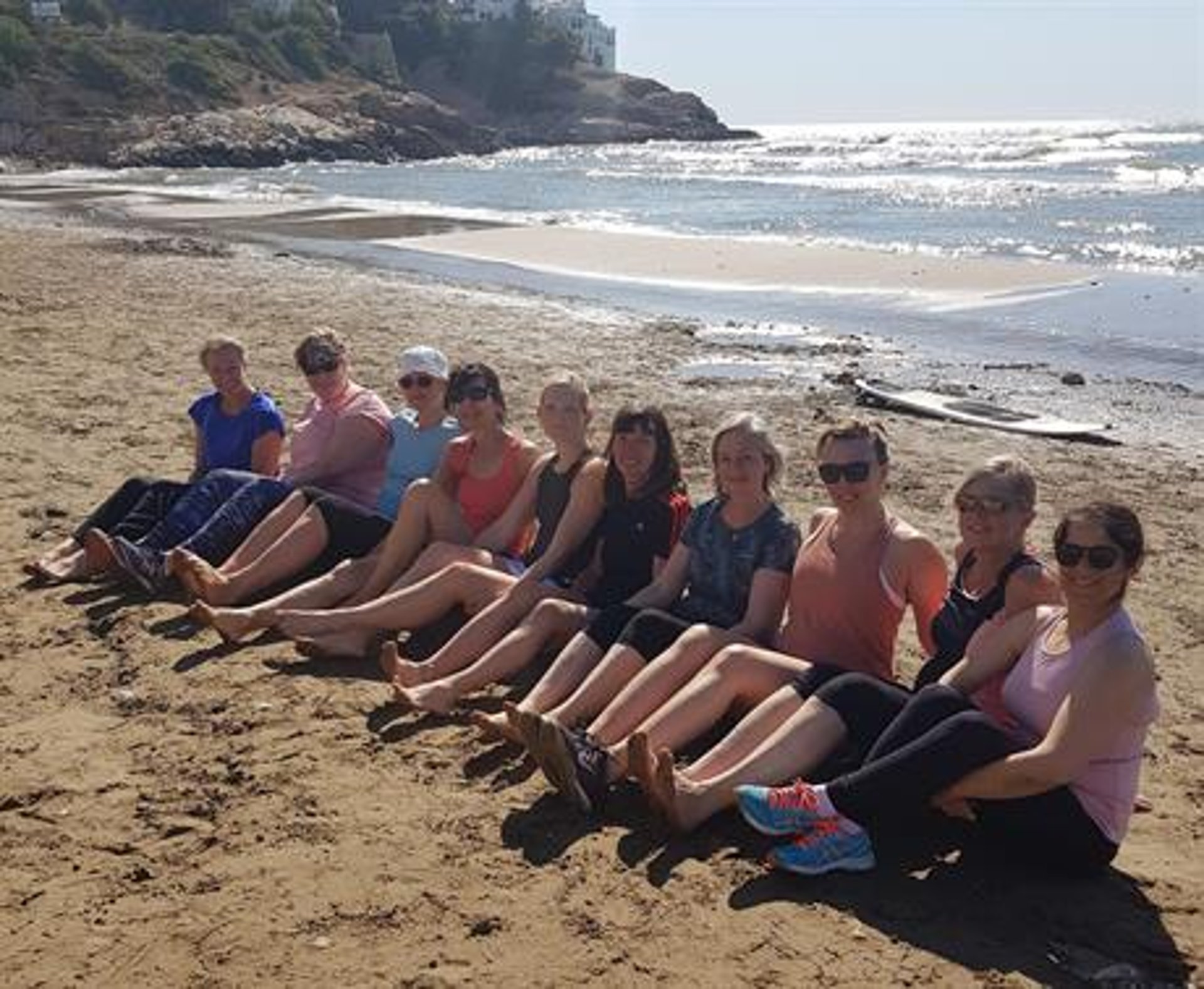 woman wearing yellow long-sleeved dress under white clouds and blue sky during daytime