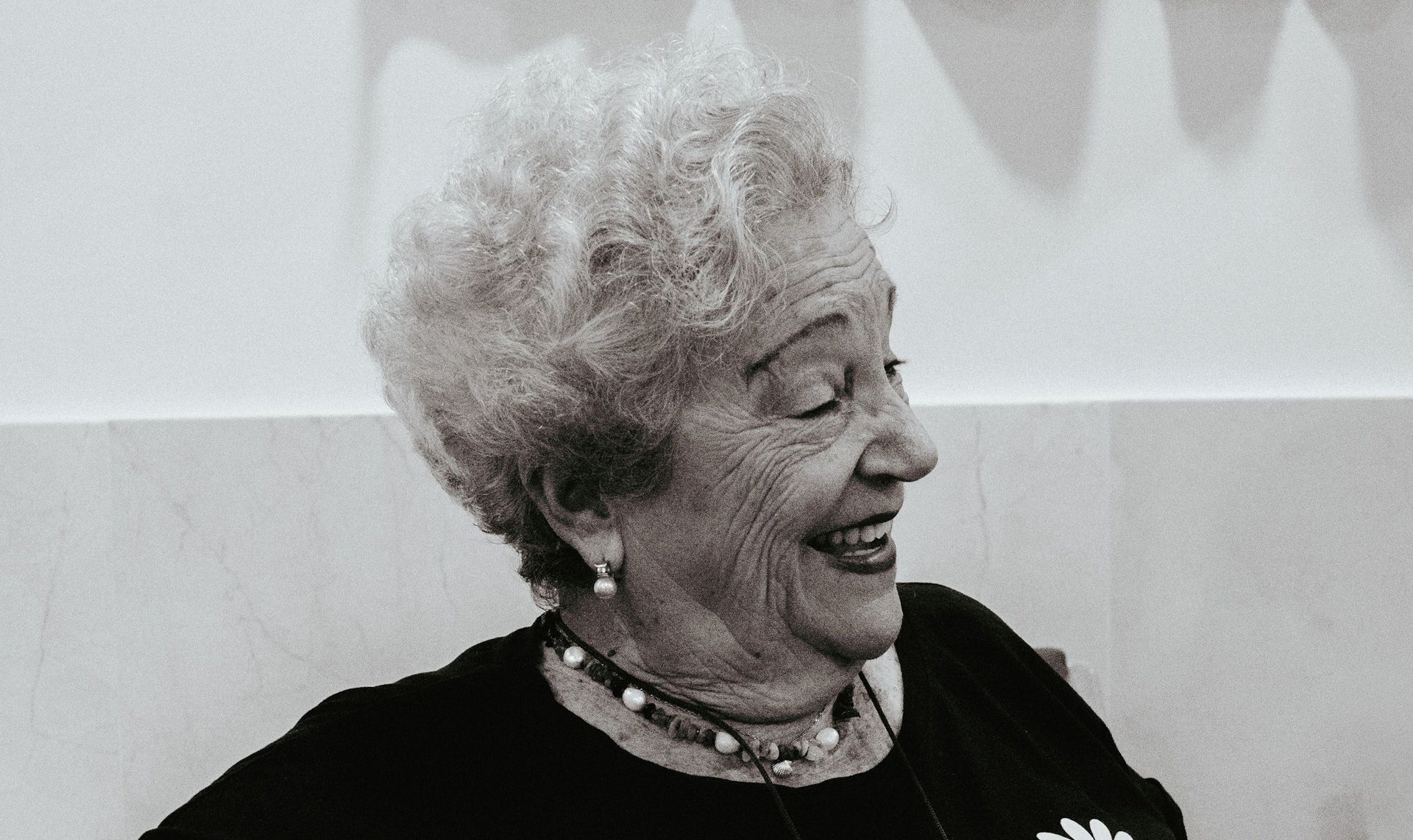 black and brown leather padded tub sofa