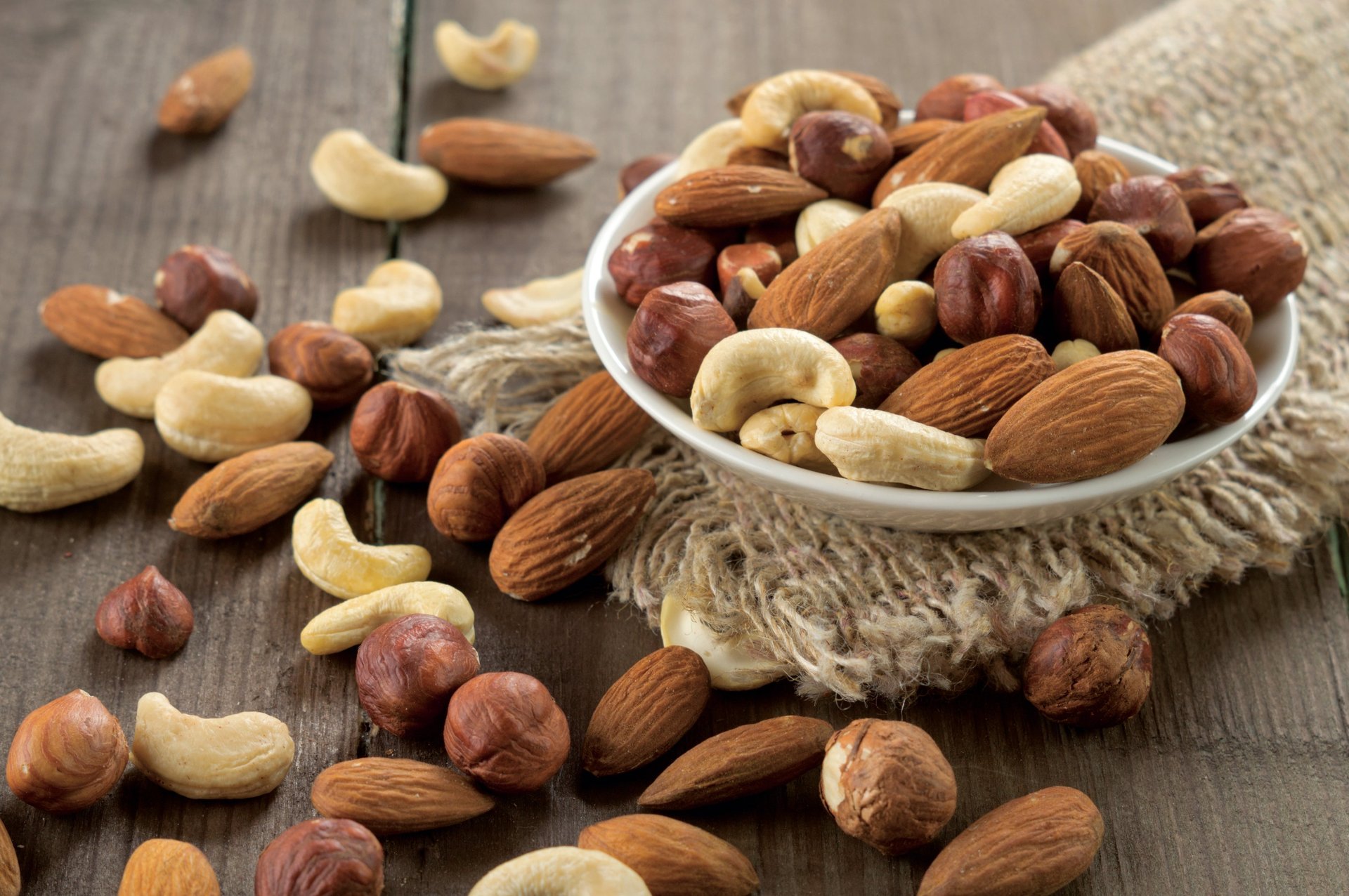 woman wearing yellow long-sleeved dress under white clouds and blue sky during daytime