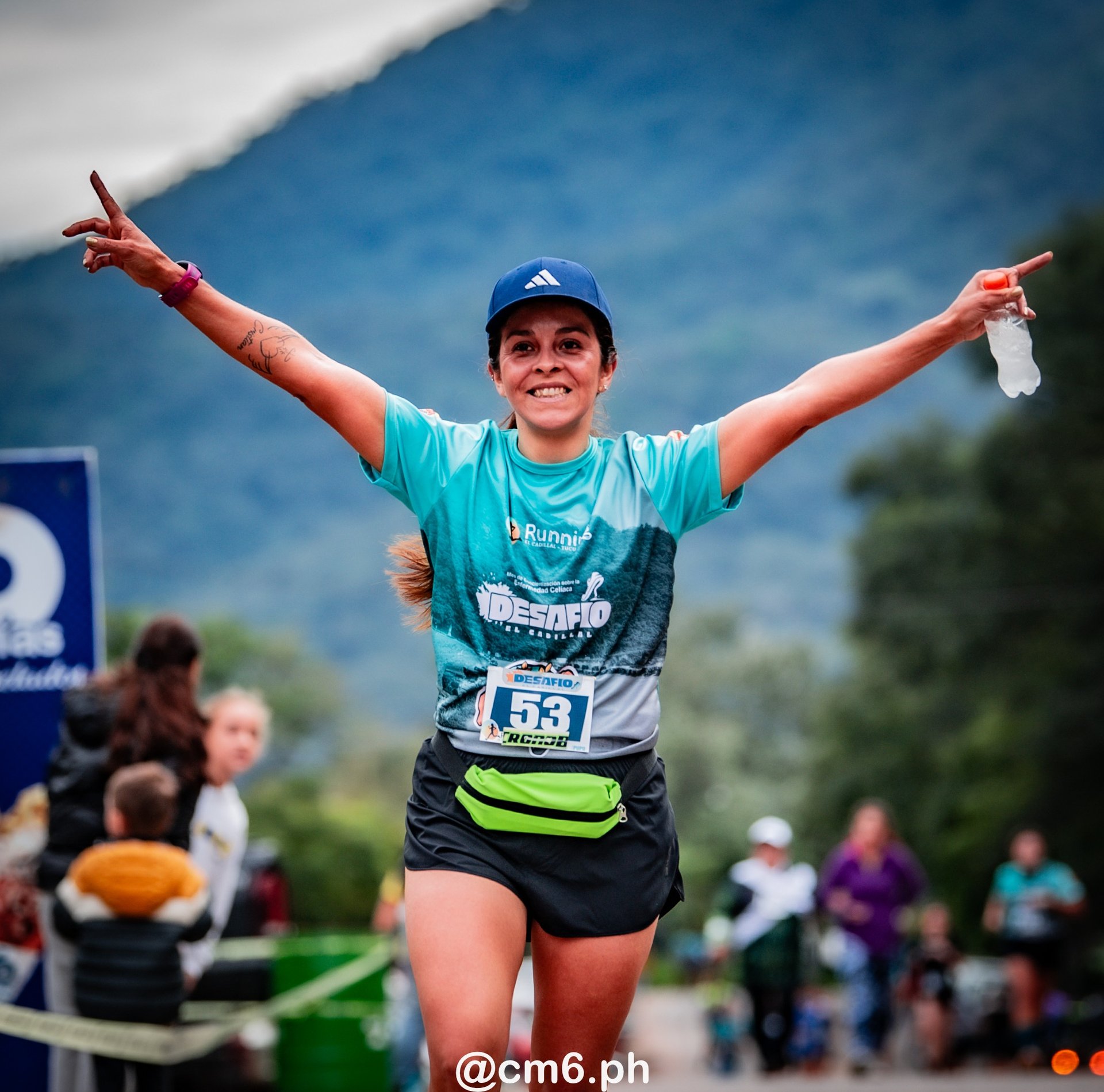 woman wearing yellow long-sleeved dress under white clouds and blue sky during daytime
