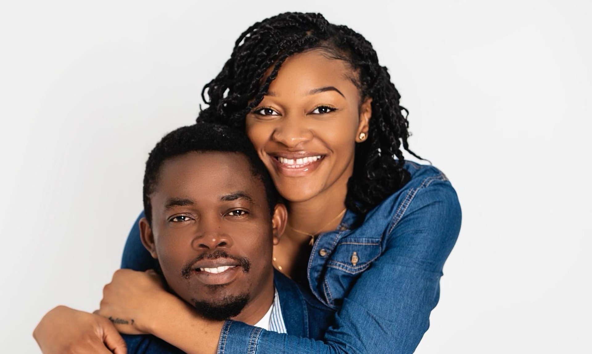 couple wearing silver-colored rings