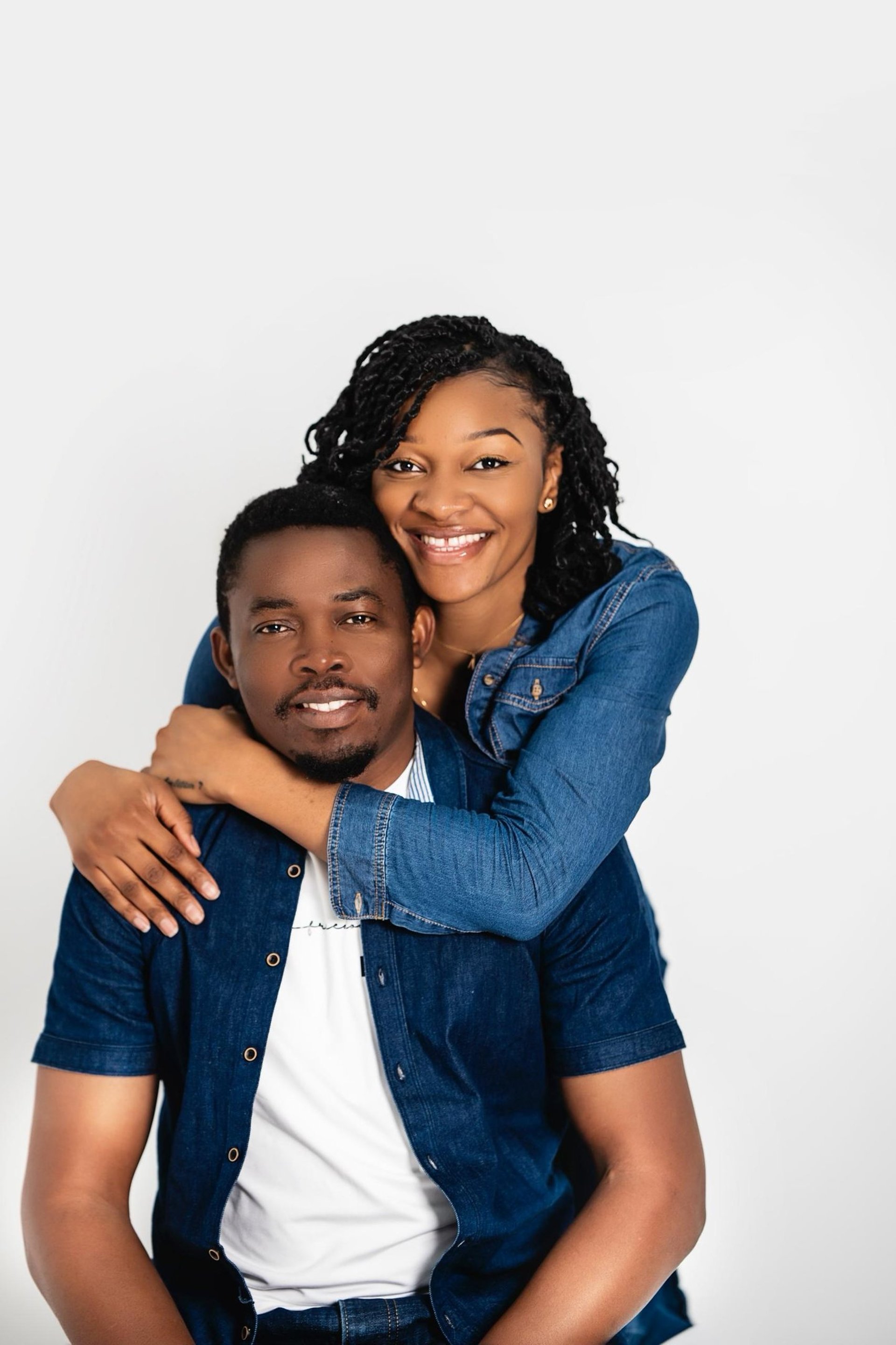 couple wearing silver-colored rings