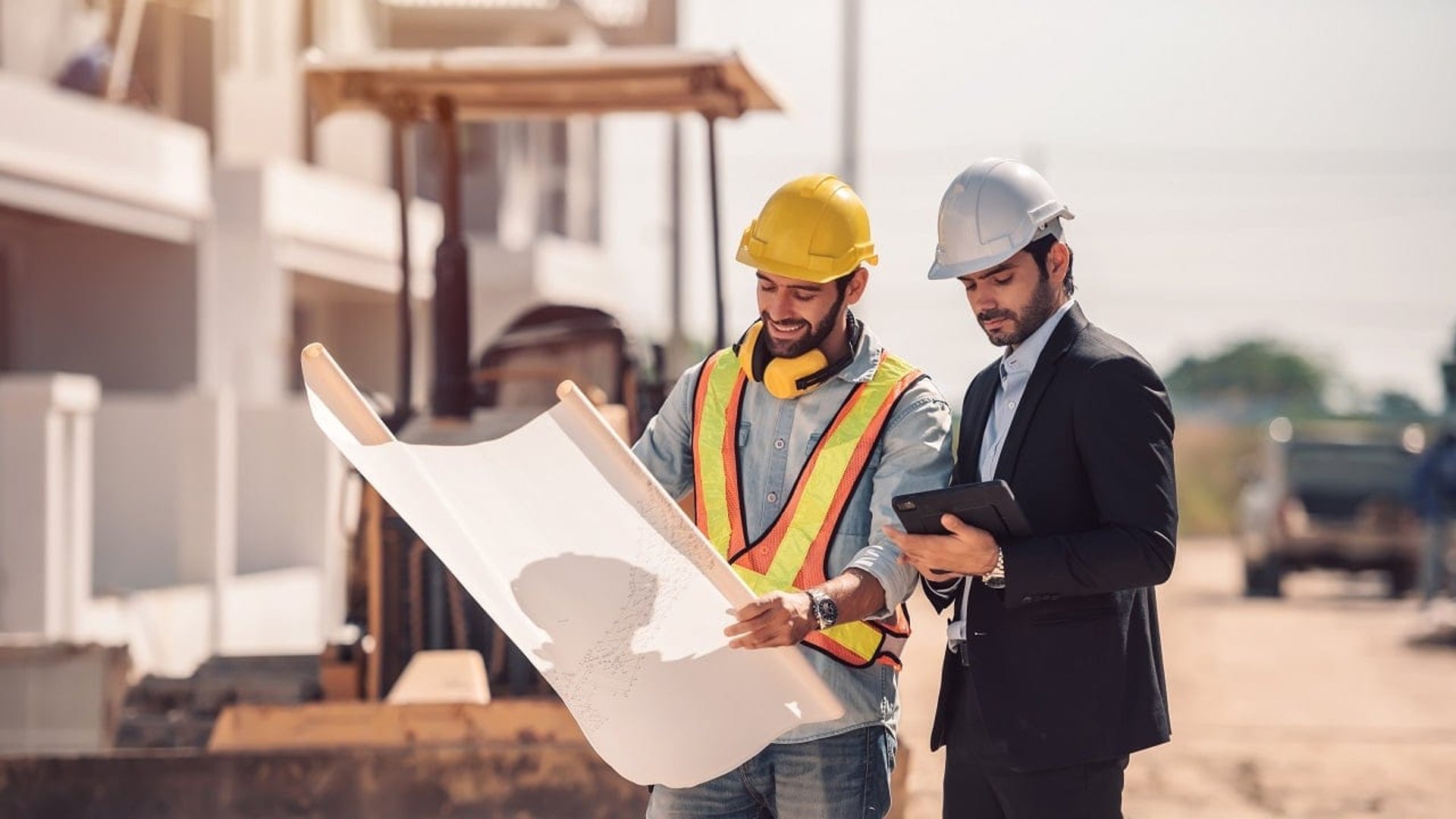 man in white hard hat standing on brown wooden dock during daytime