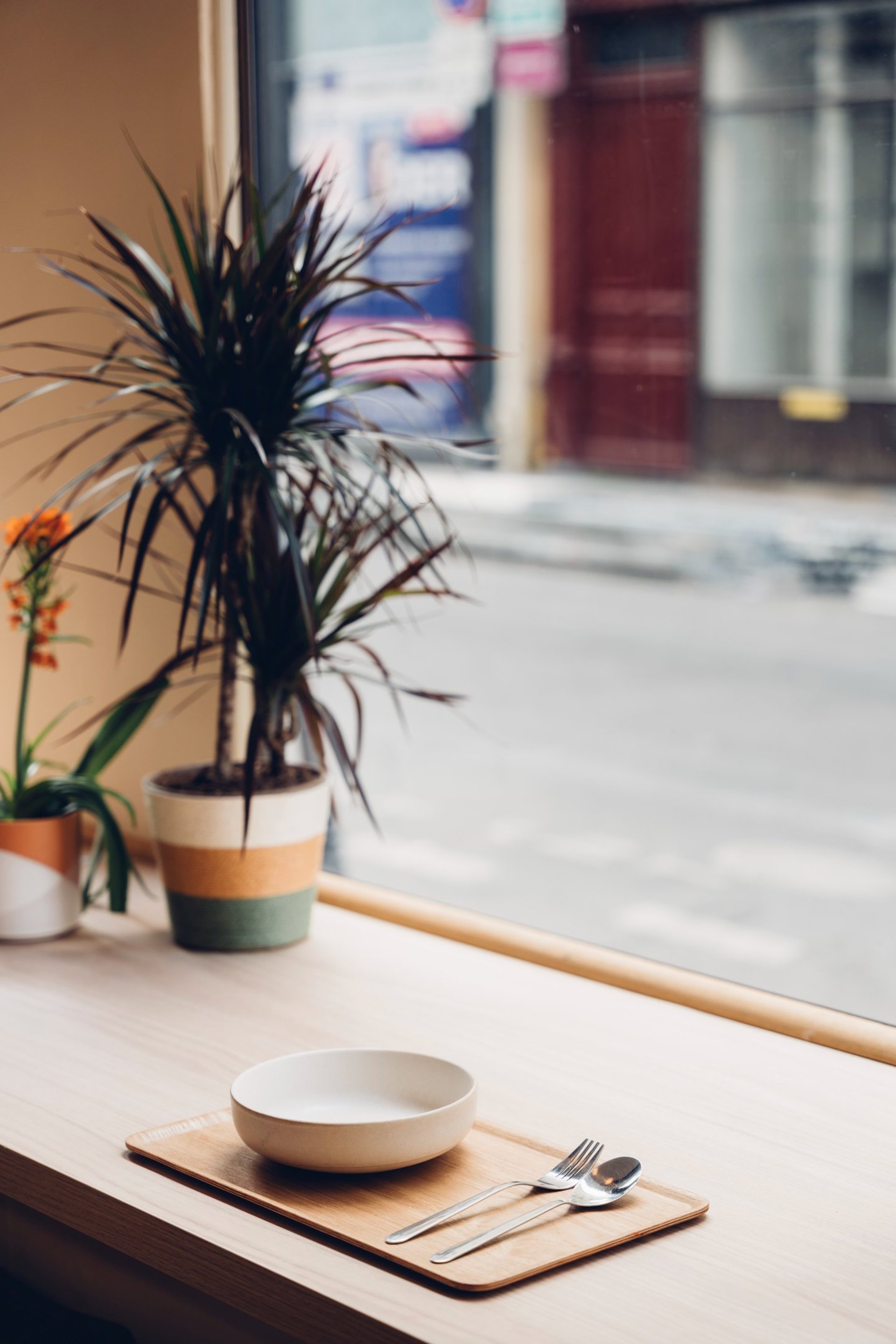 an abstract photo of a curved building with a blue sky in the background
