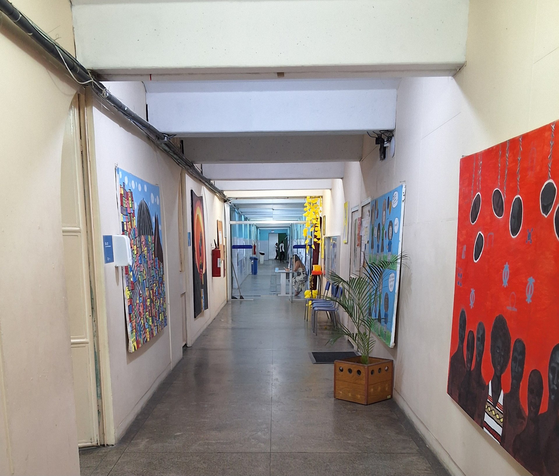 an abstract photo of a curved building with a blue sky in the background