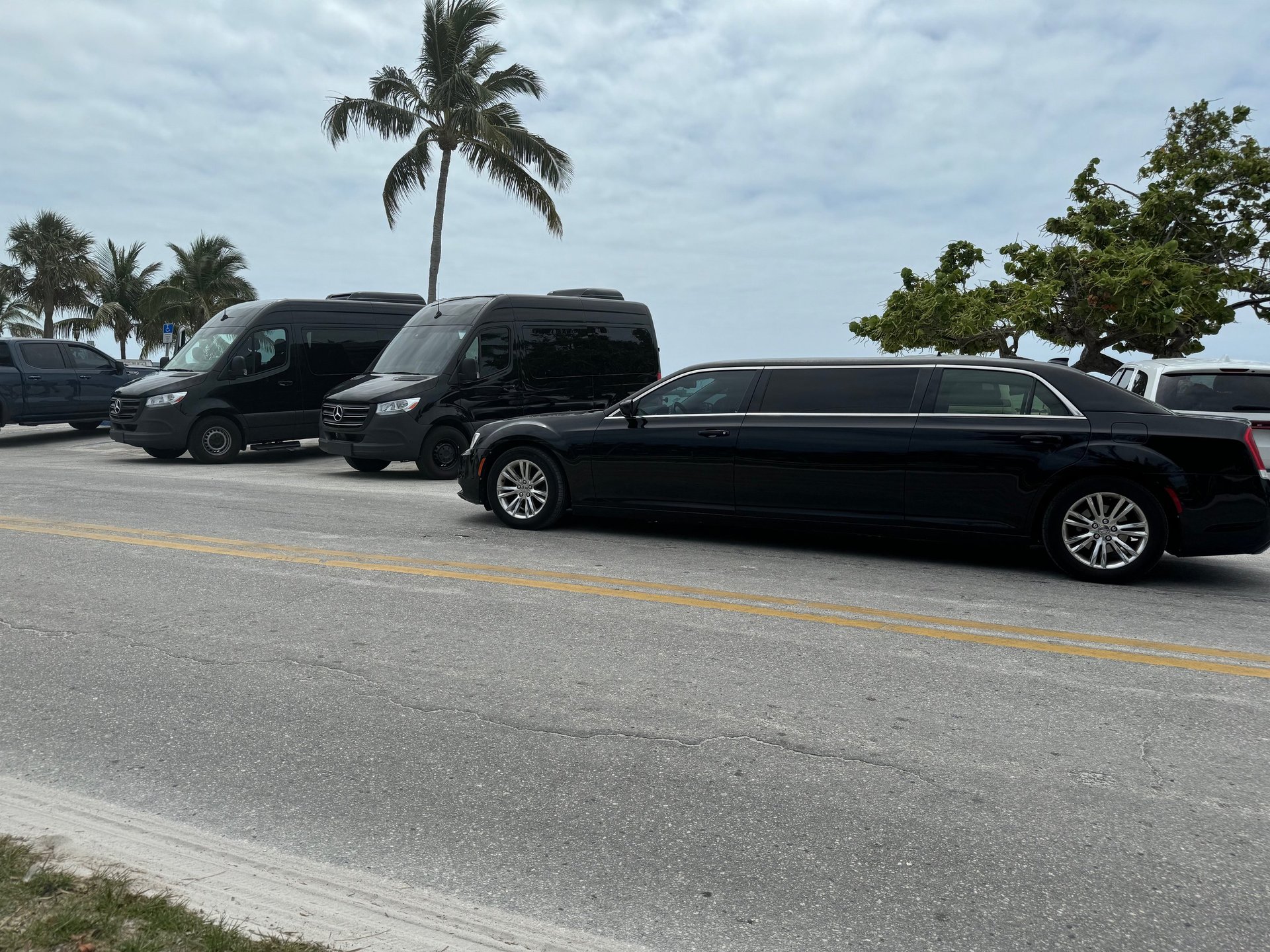 an abstract photo of a curved building with a blue sky in the background