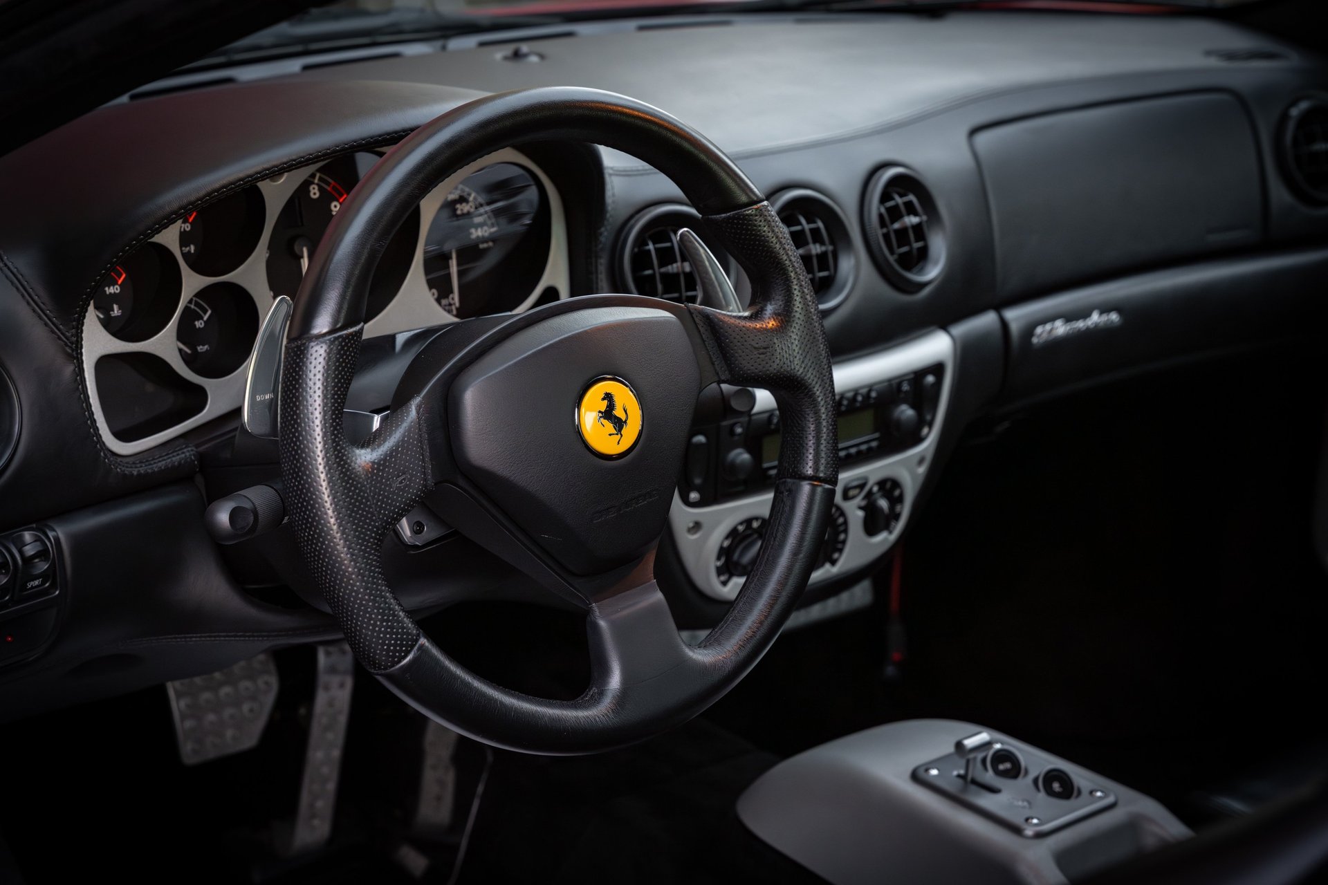 an abstract photo of a curved building with a blue sky in the background