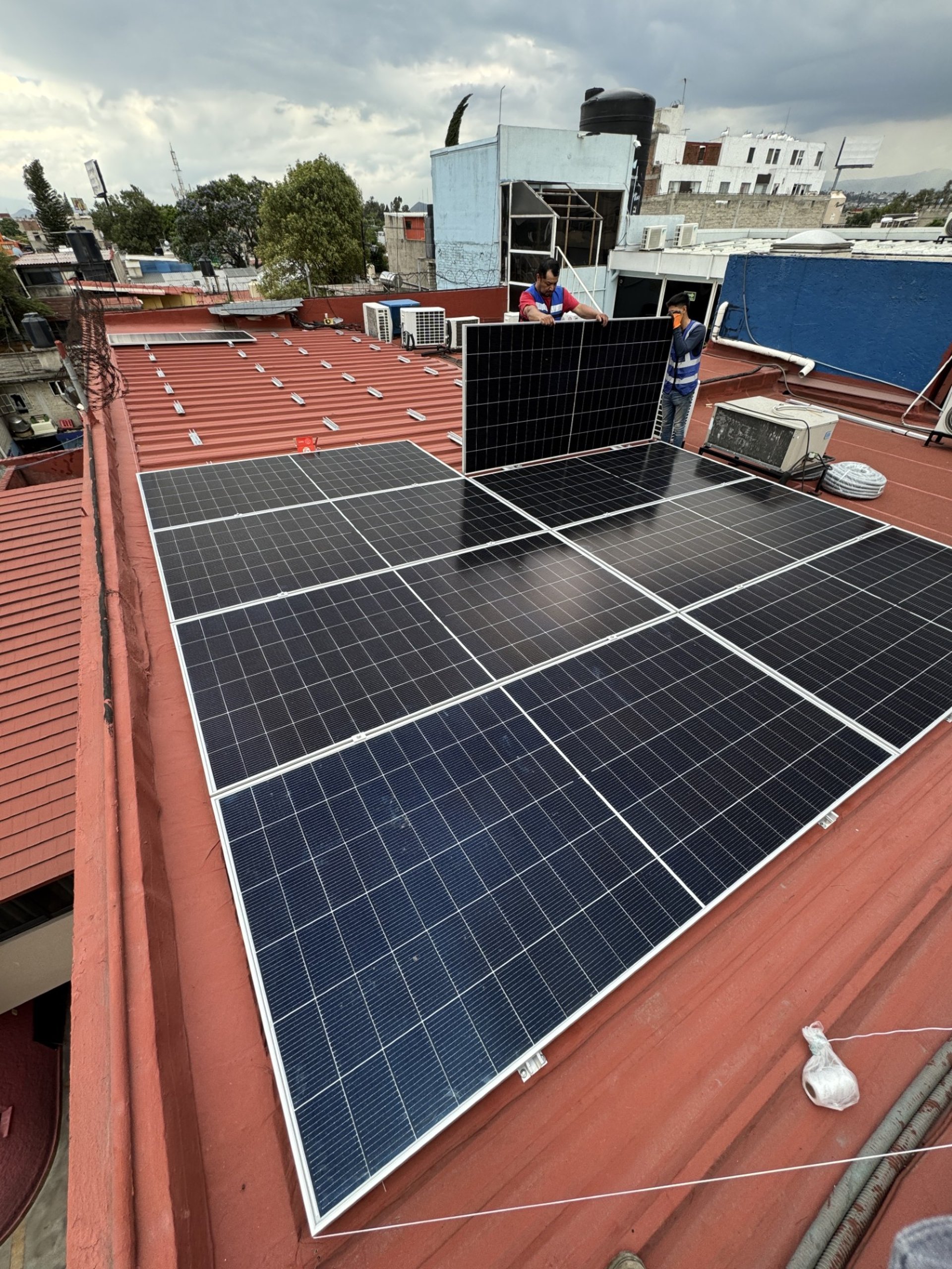 an abstract photo of a curved building with a blue sky in the background