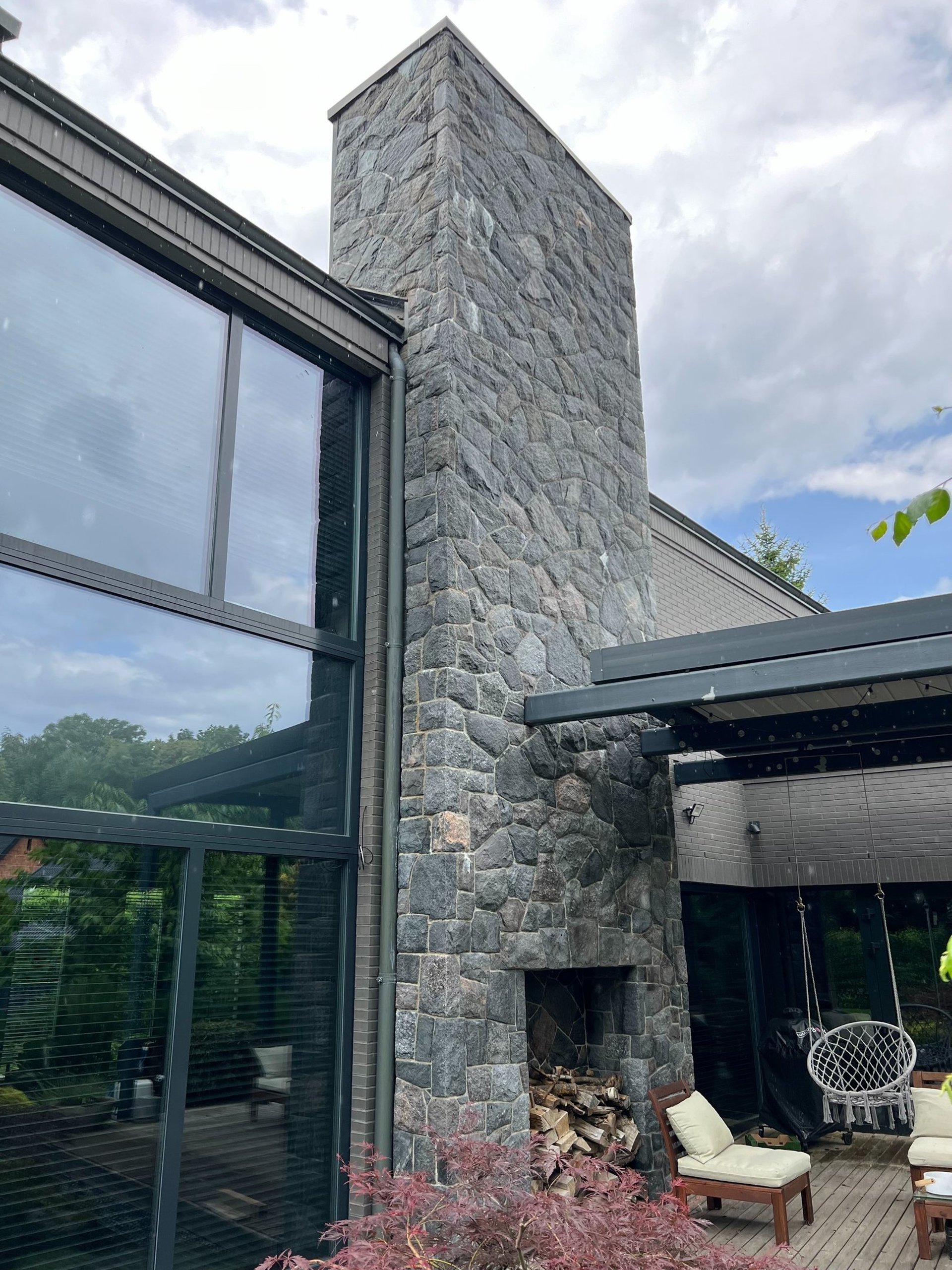 black and brown leather padded tub sofa