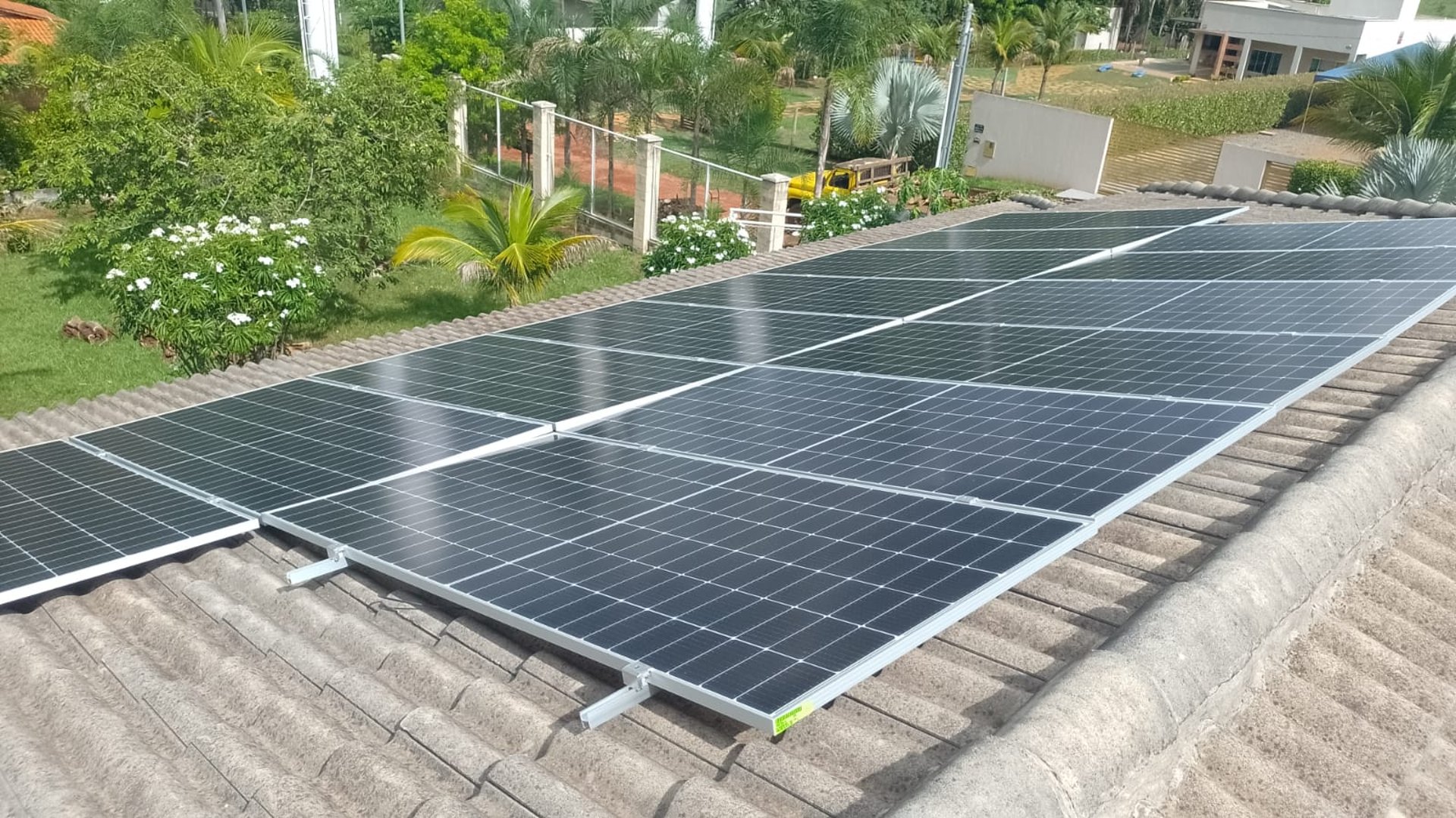 woman wearing yellow long-sleeved dress under white clouds and blue sky during daytime