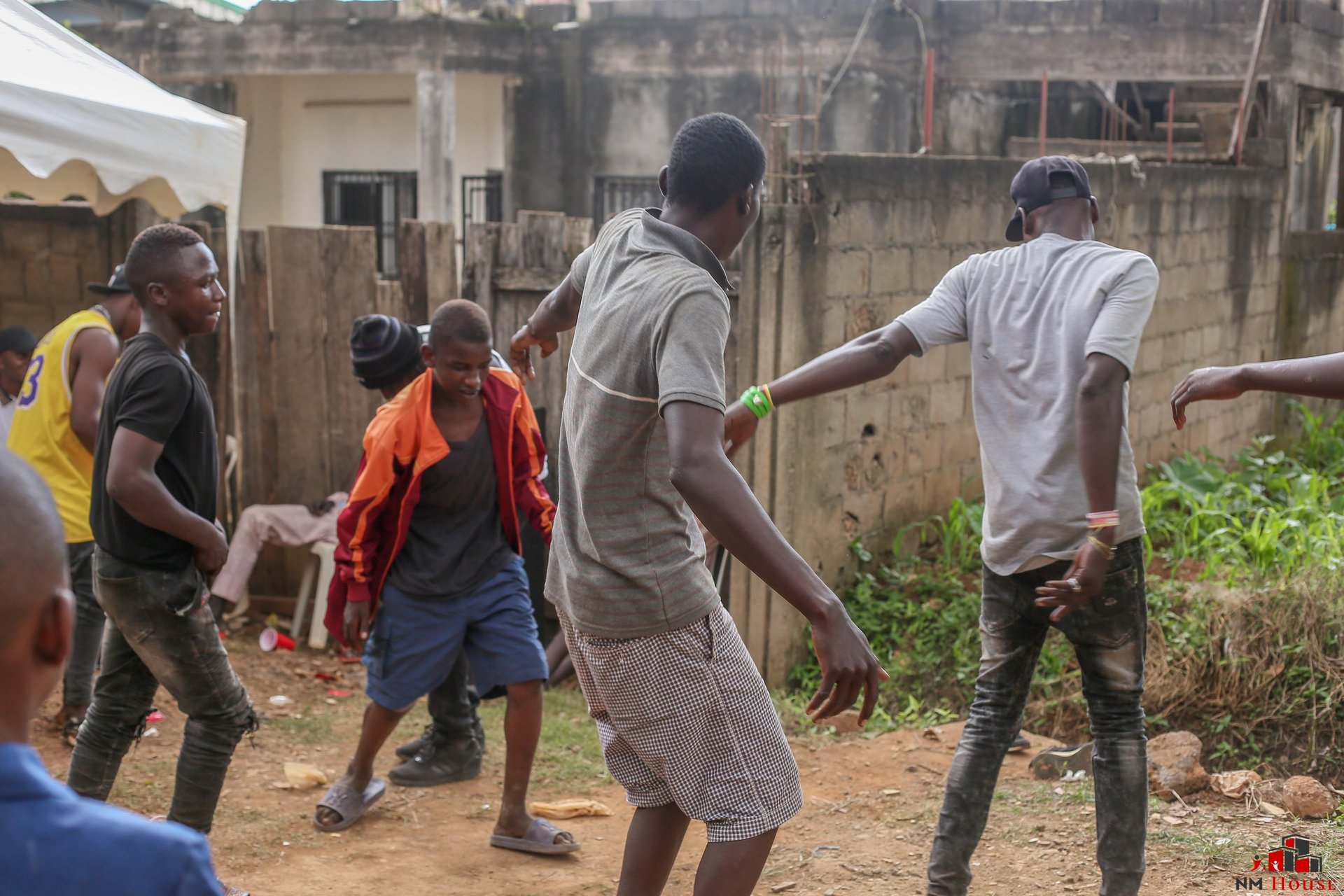 woman wearing yellow long-sleeved dress under white clouds and blue sky during daytime