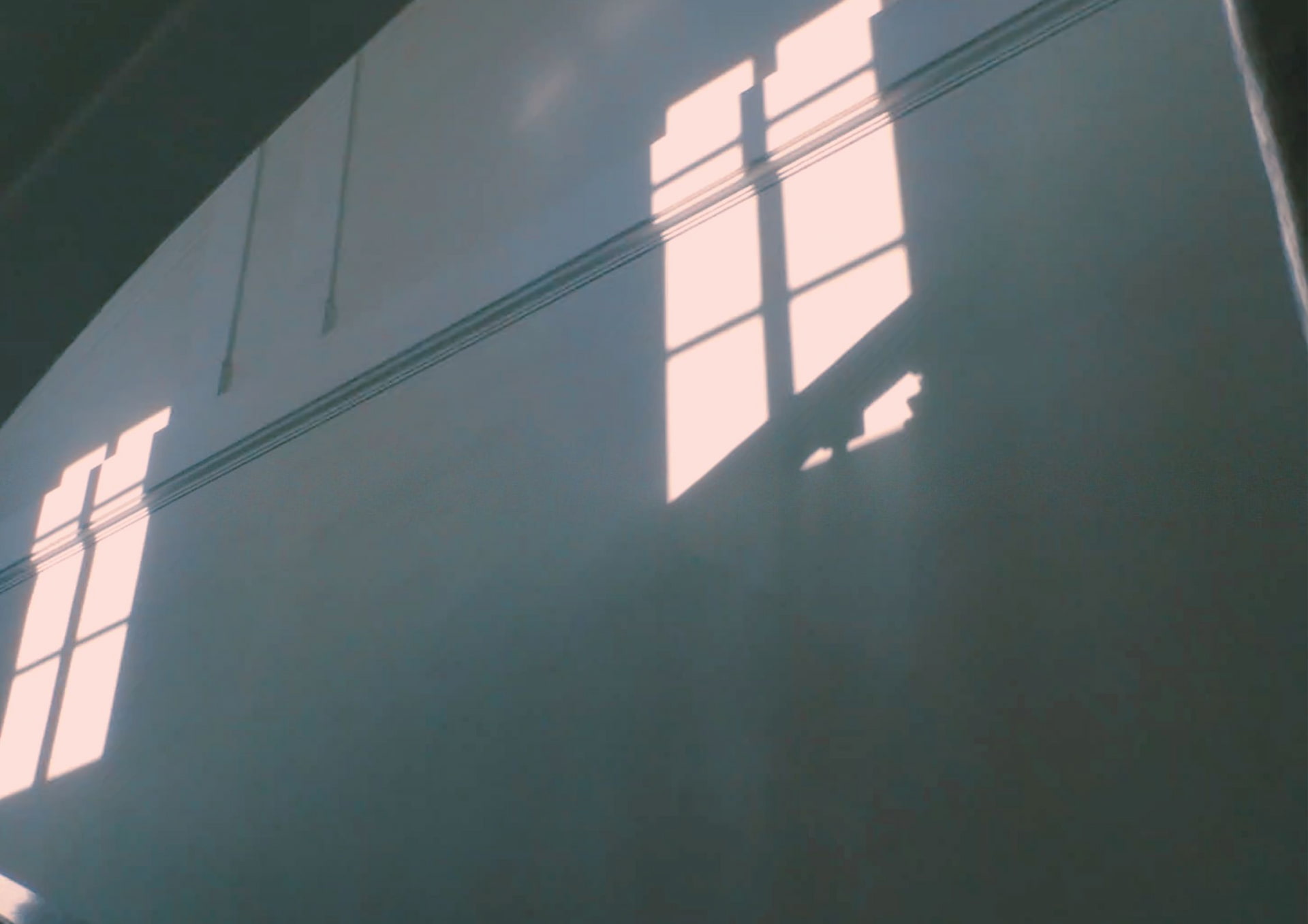 Alles Anders poetical digital storytelling by Tina Bikic — soft window light casting reflection on wall