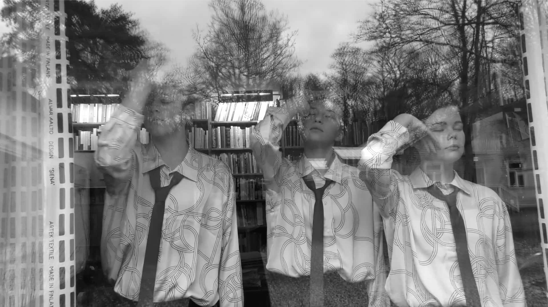 Poetical Digital Storytelling fragment by Tina Bikic – figures reflected behind glass, memory and fragments.