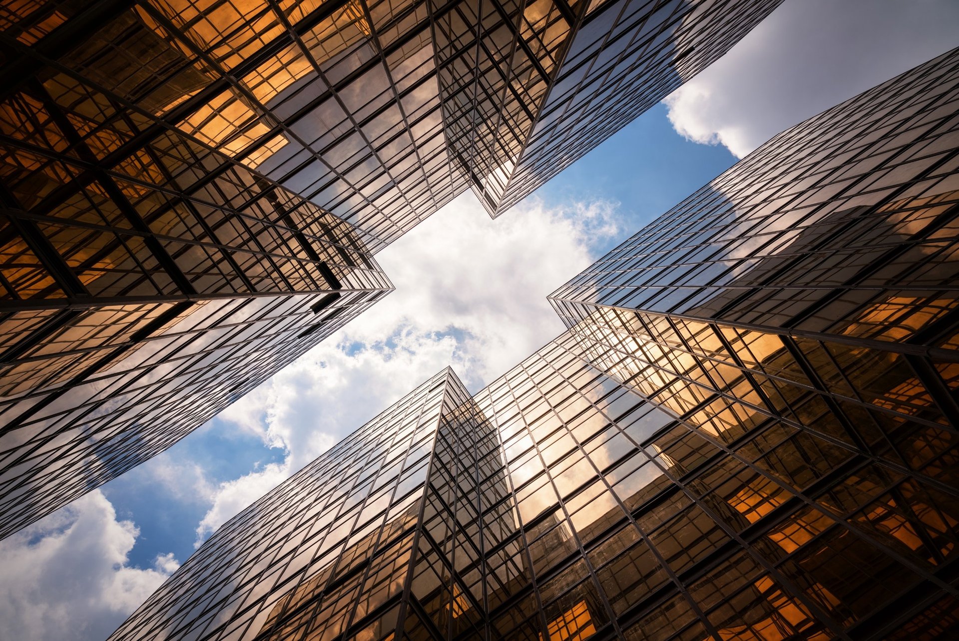 low angle photo of curtain wall building