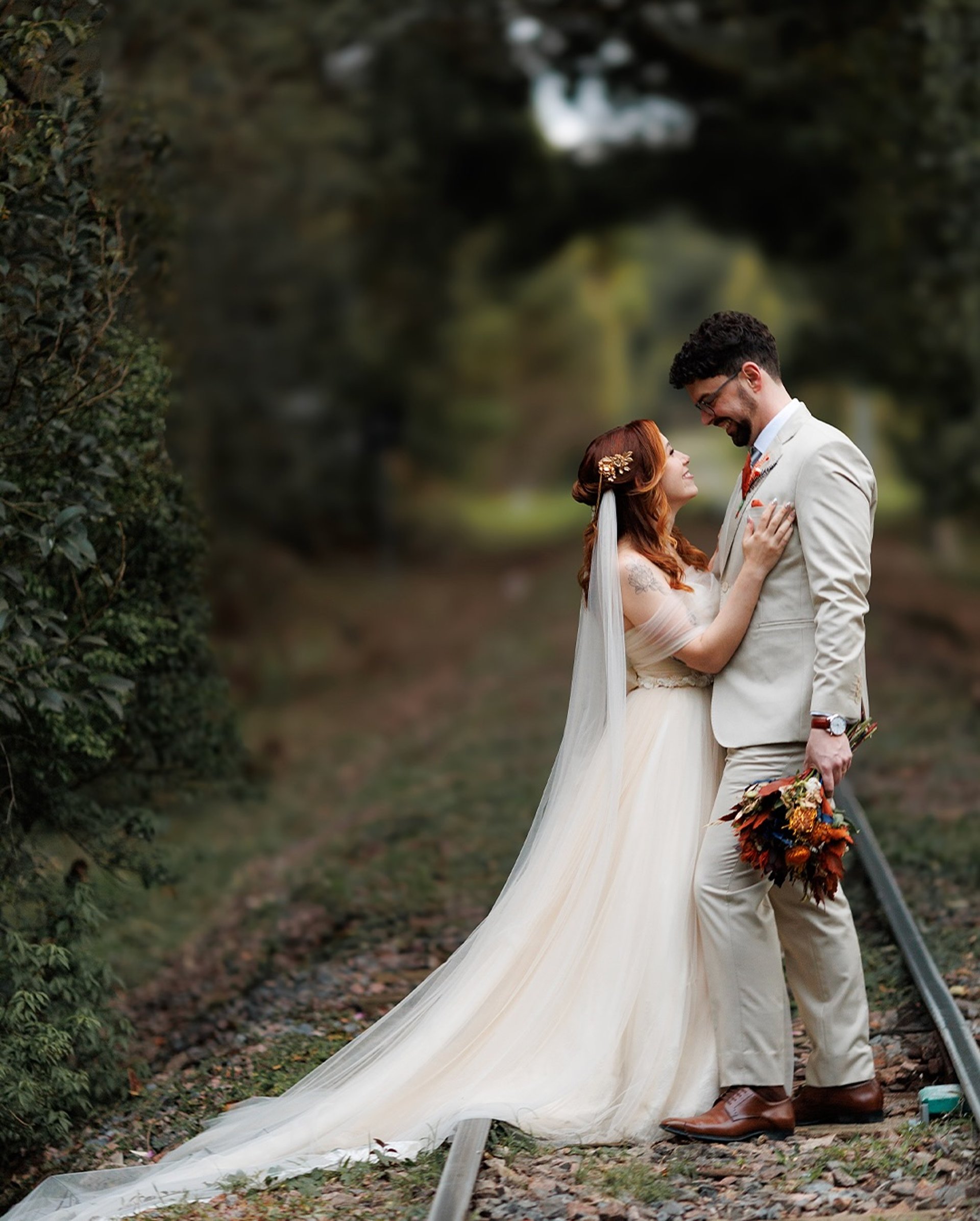 an abstract photo of a curved building with a blue sky in the background