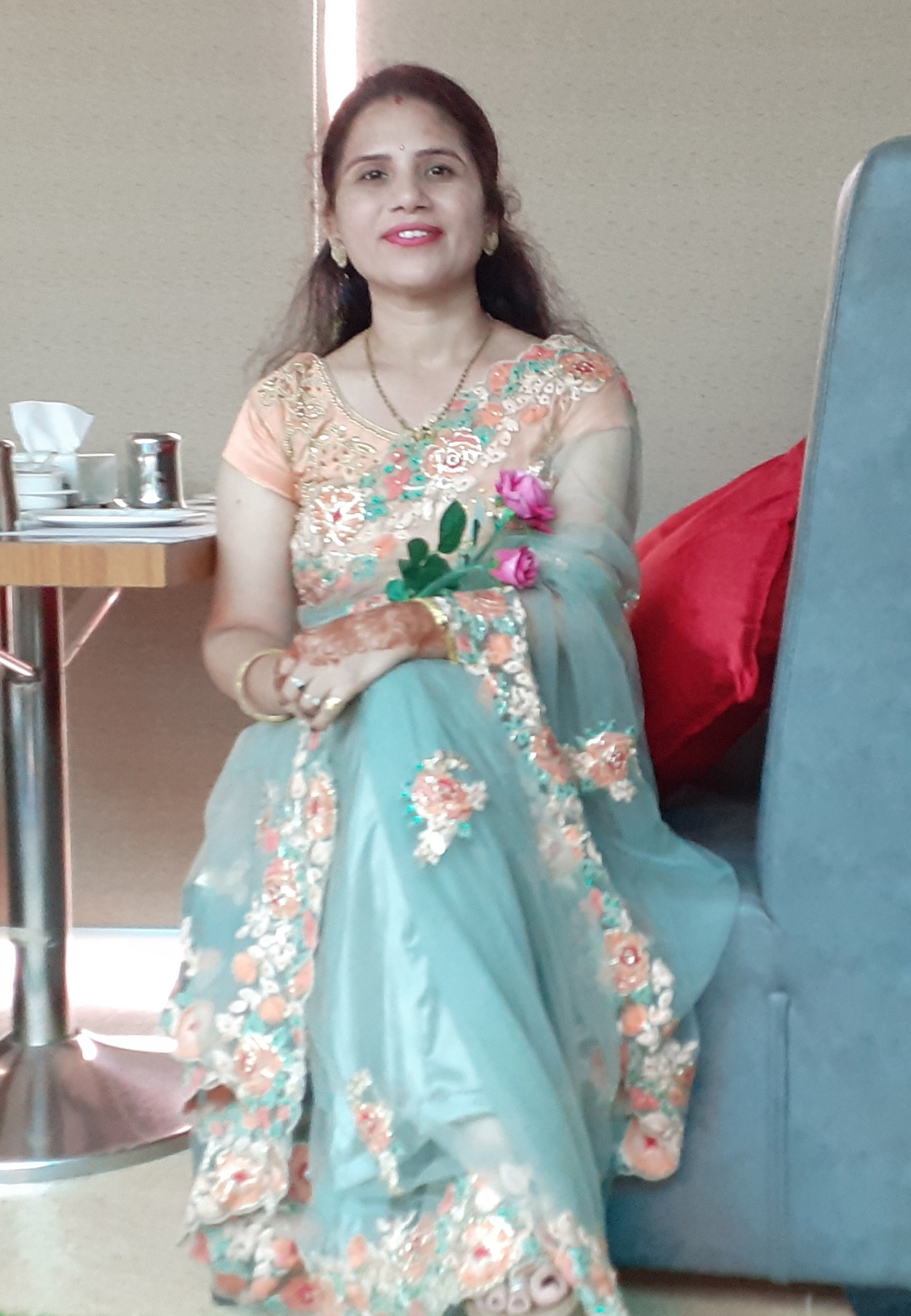 person wearing grey knit sweater