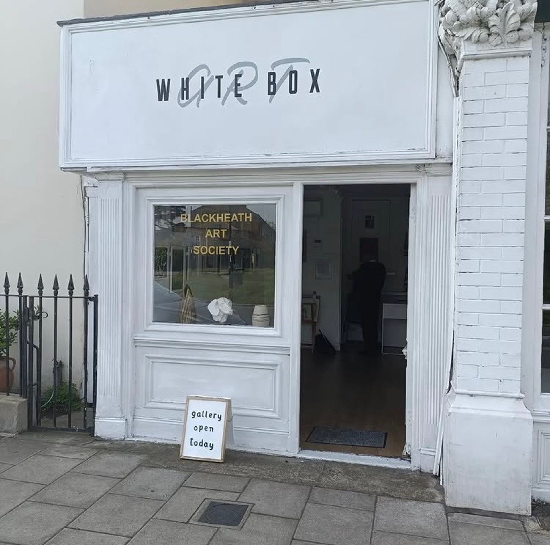 black and brown leather padded tub sofa