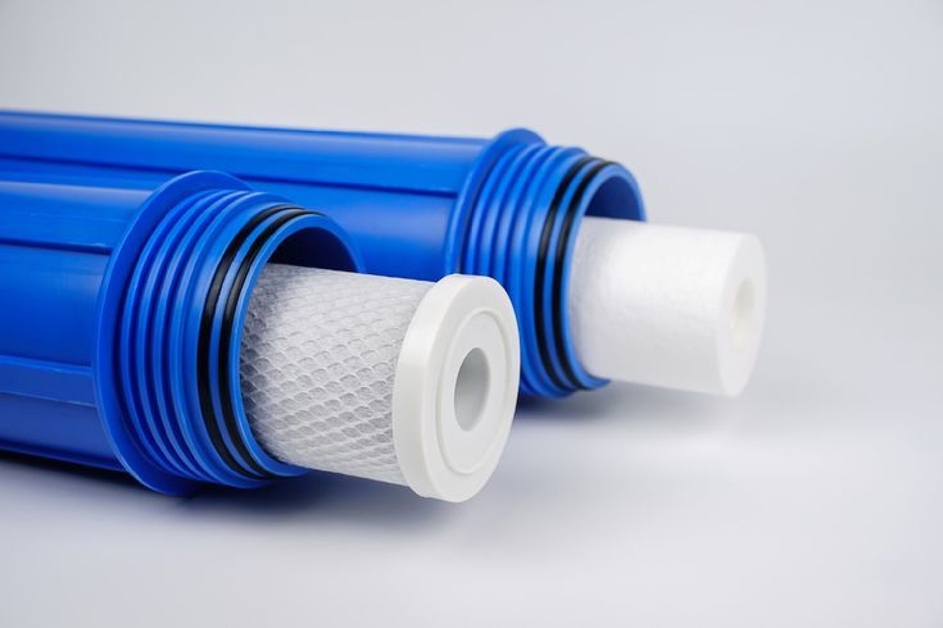 woman wearing yellow long-sleeved dress under white clouds and blue sky during daytime