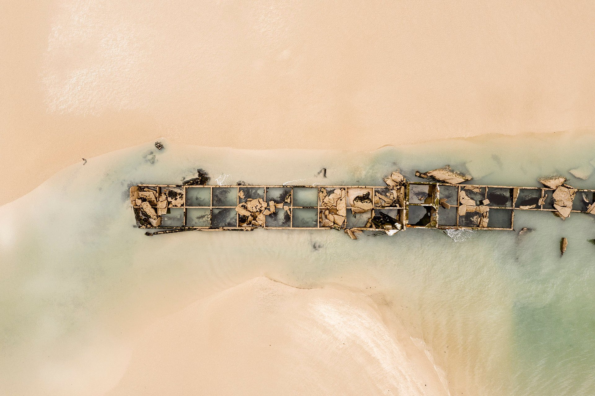 woman in white and brown dress standing on green grass during night time