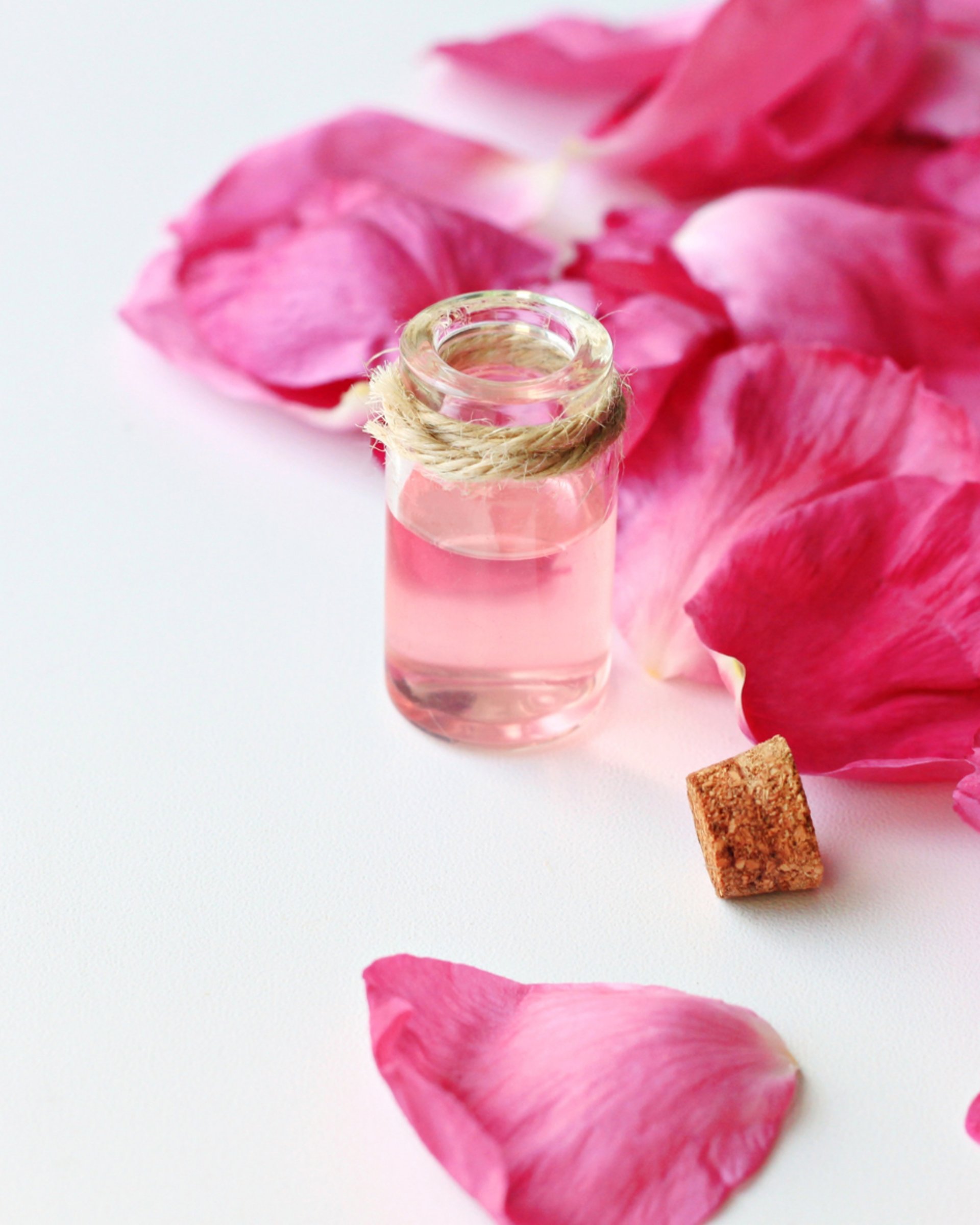 an abstract photo of a curved building with a blue sky in the background