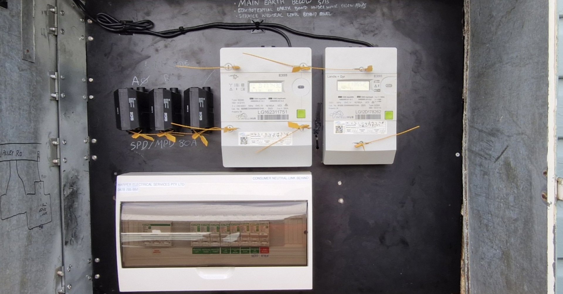 an abstract photo of a curved building with a blue sky in the background