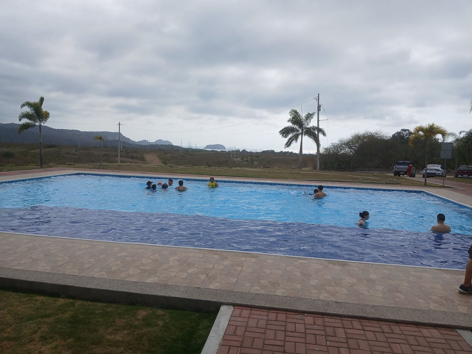 an abstract photo of a curved building with a blue sky in the background