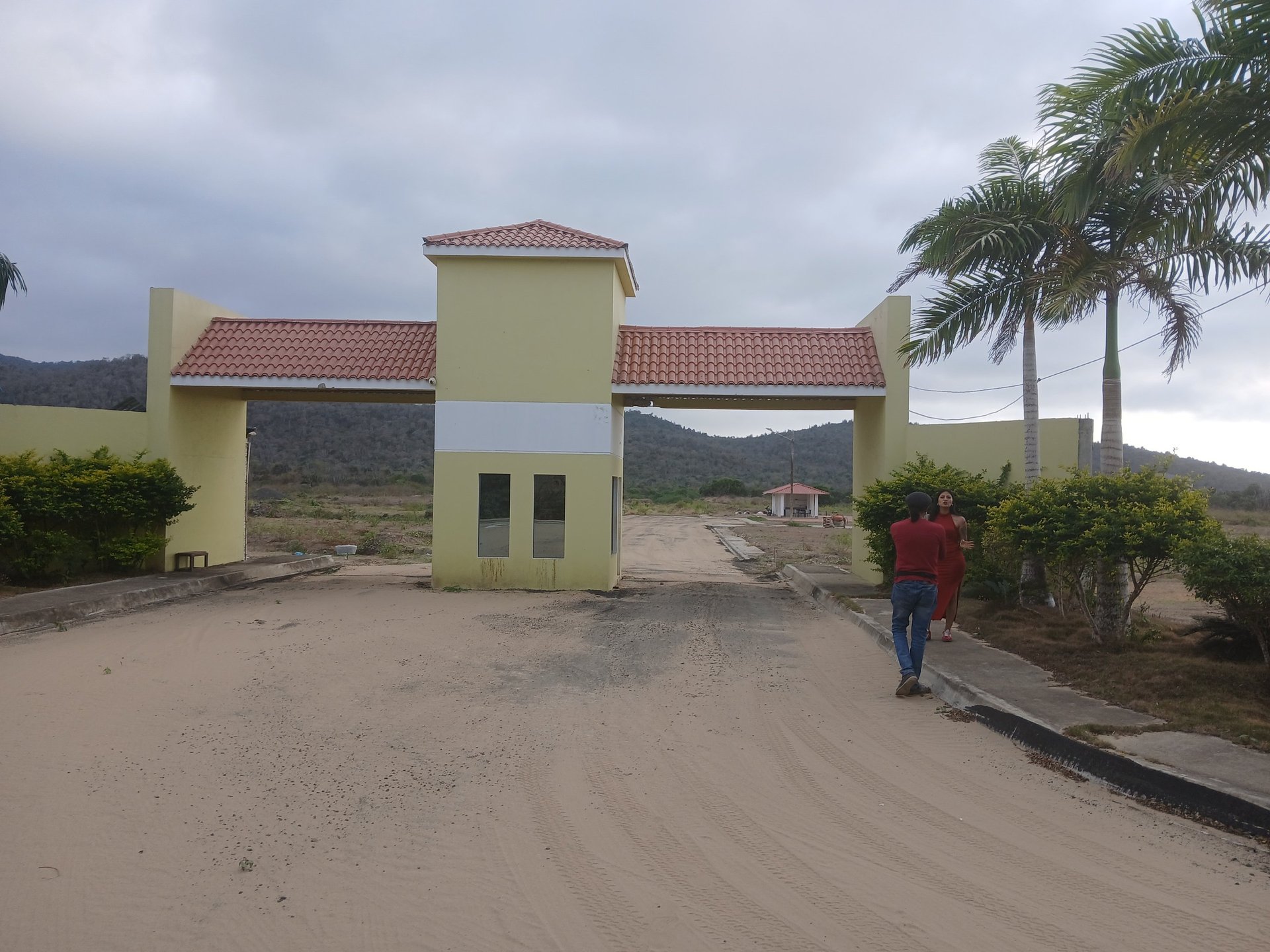 an abstract photo of a curved building with a blue sky in the background
