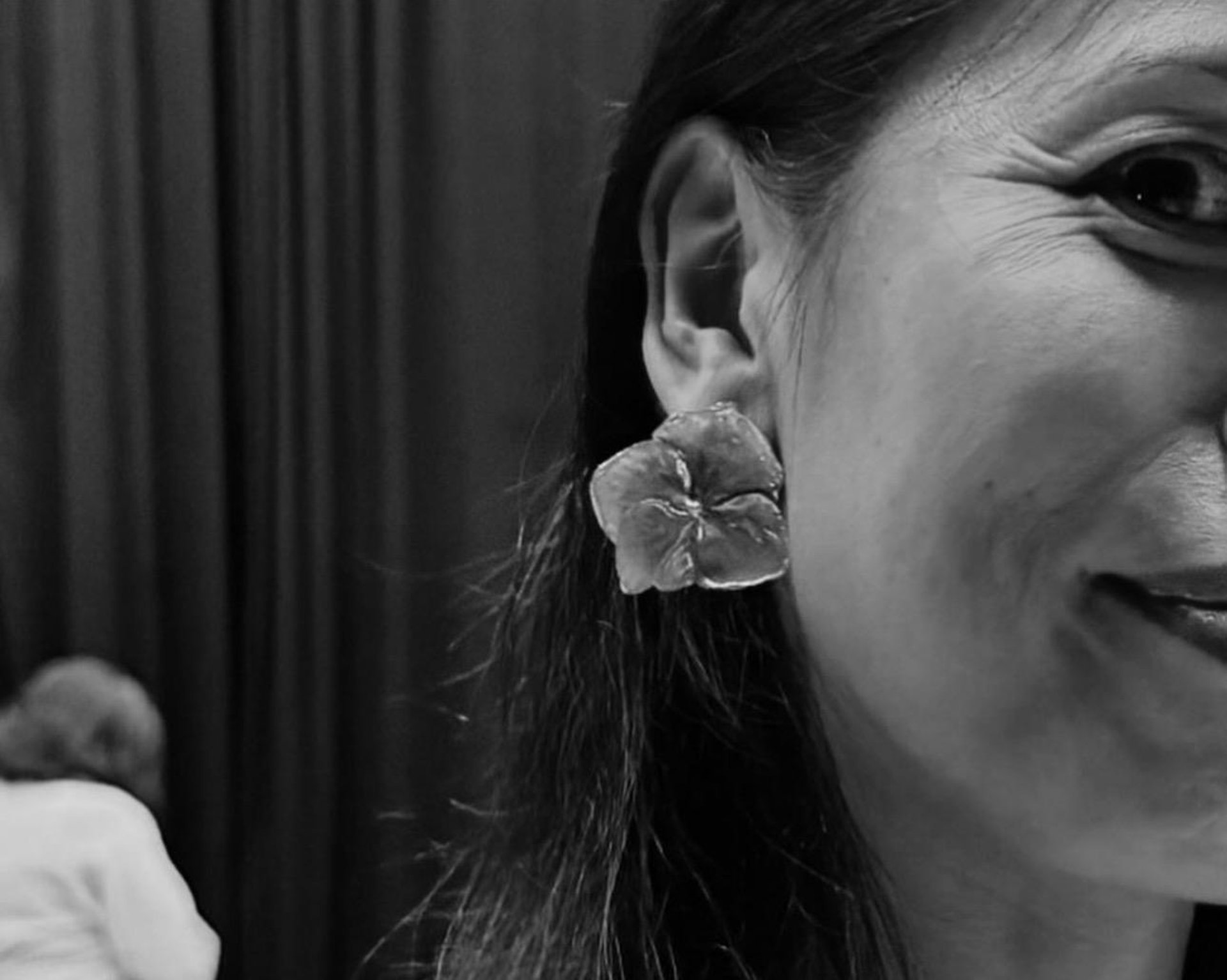 woman wearing yellow long-sleeved dress under white clouds and blue sky during daytime