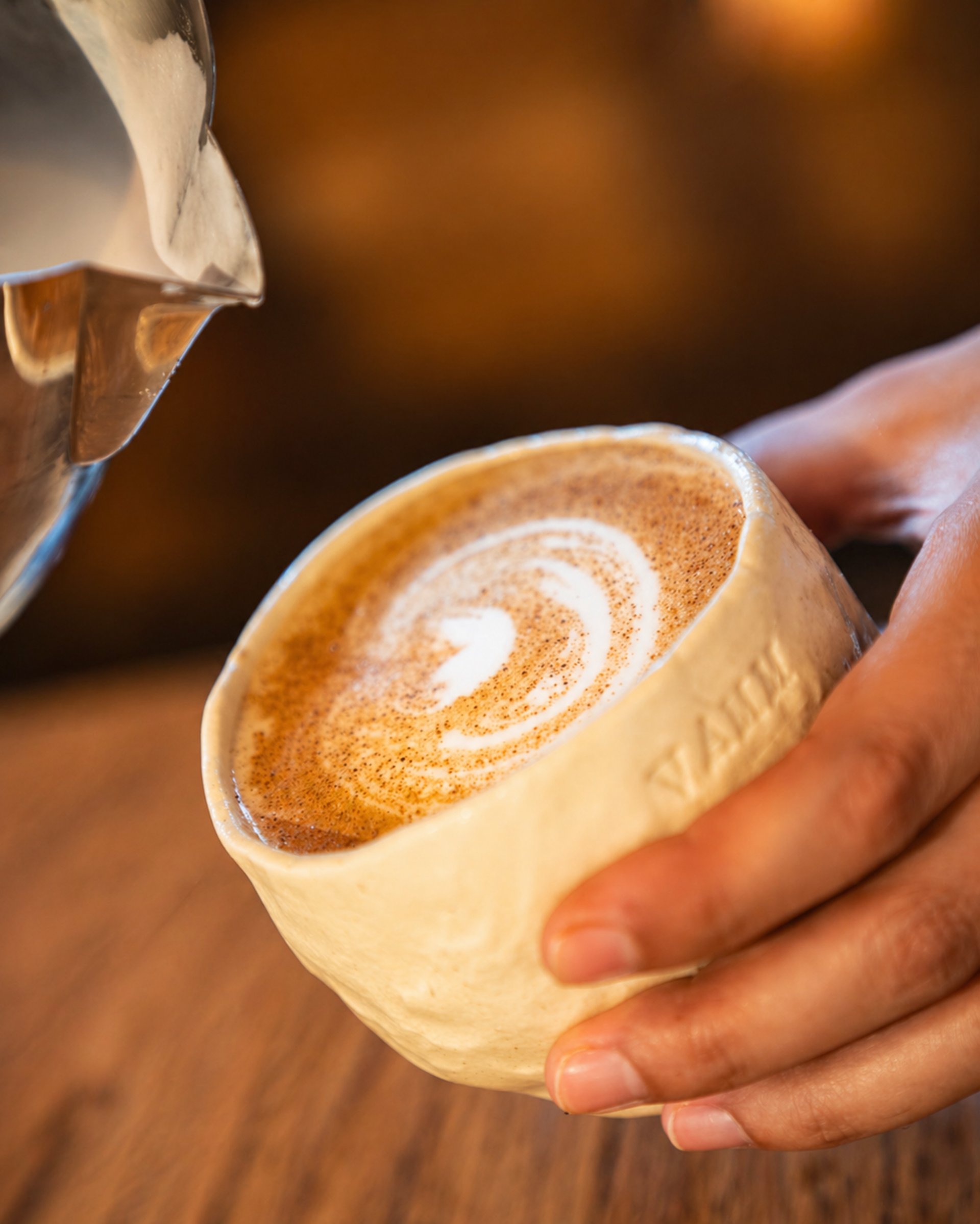 woman wearing yellow long-sleeved dress under white clouds and blue sky during daytime