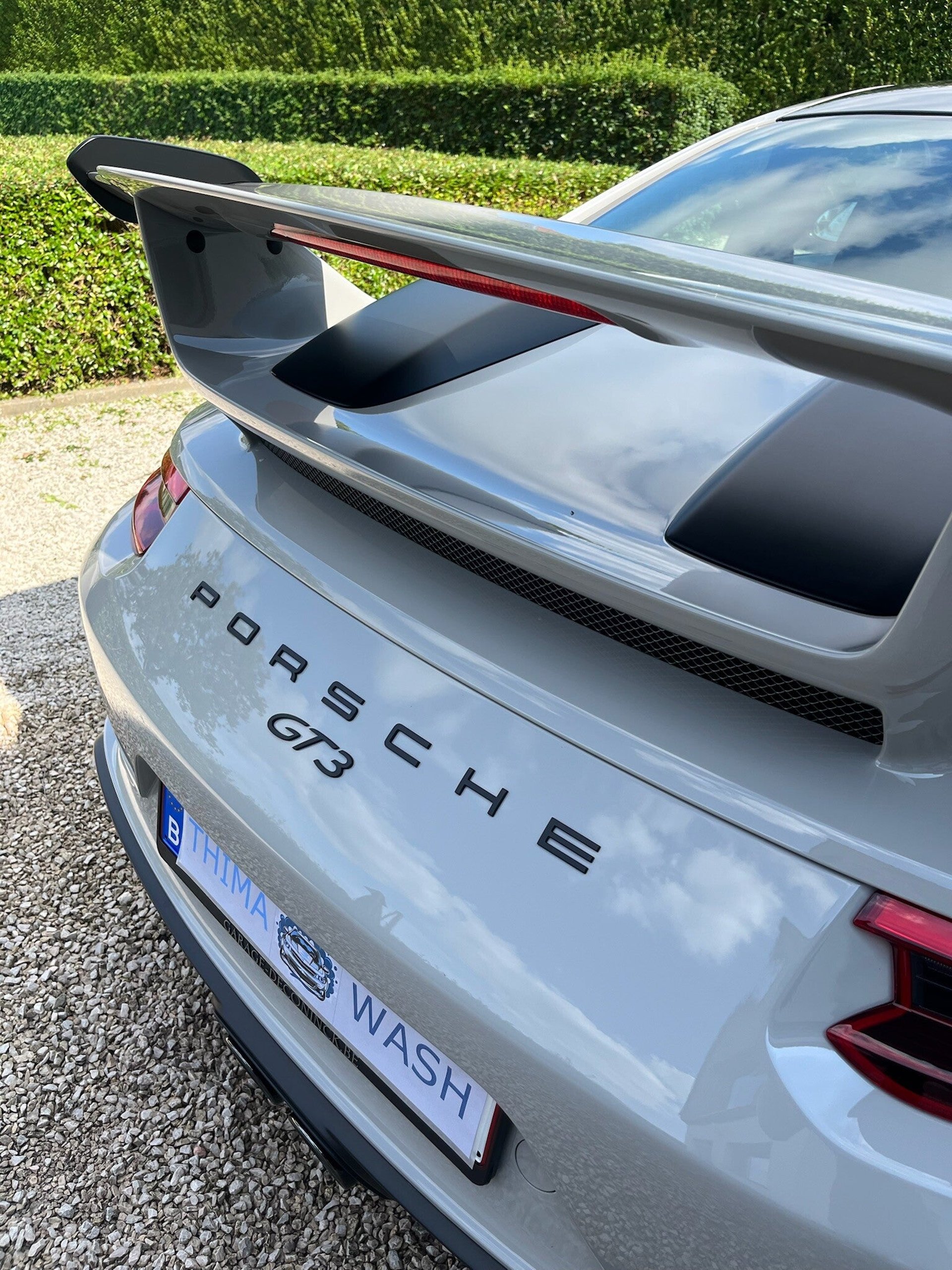 a close up of a black and brown abstract painting