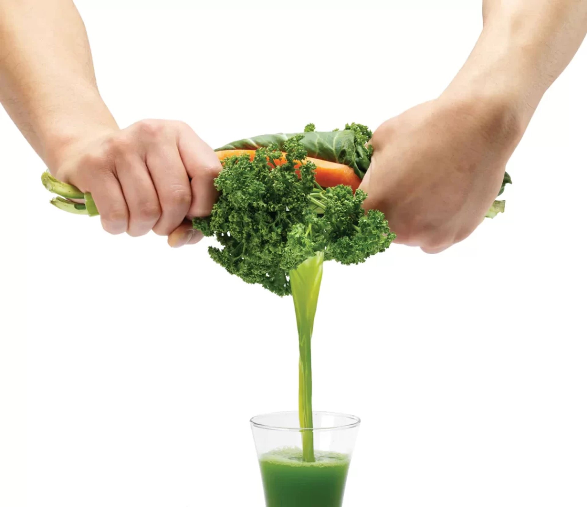 Cold pressing fresh ingredients from The Raw Root Co.