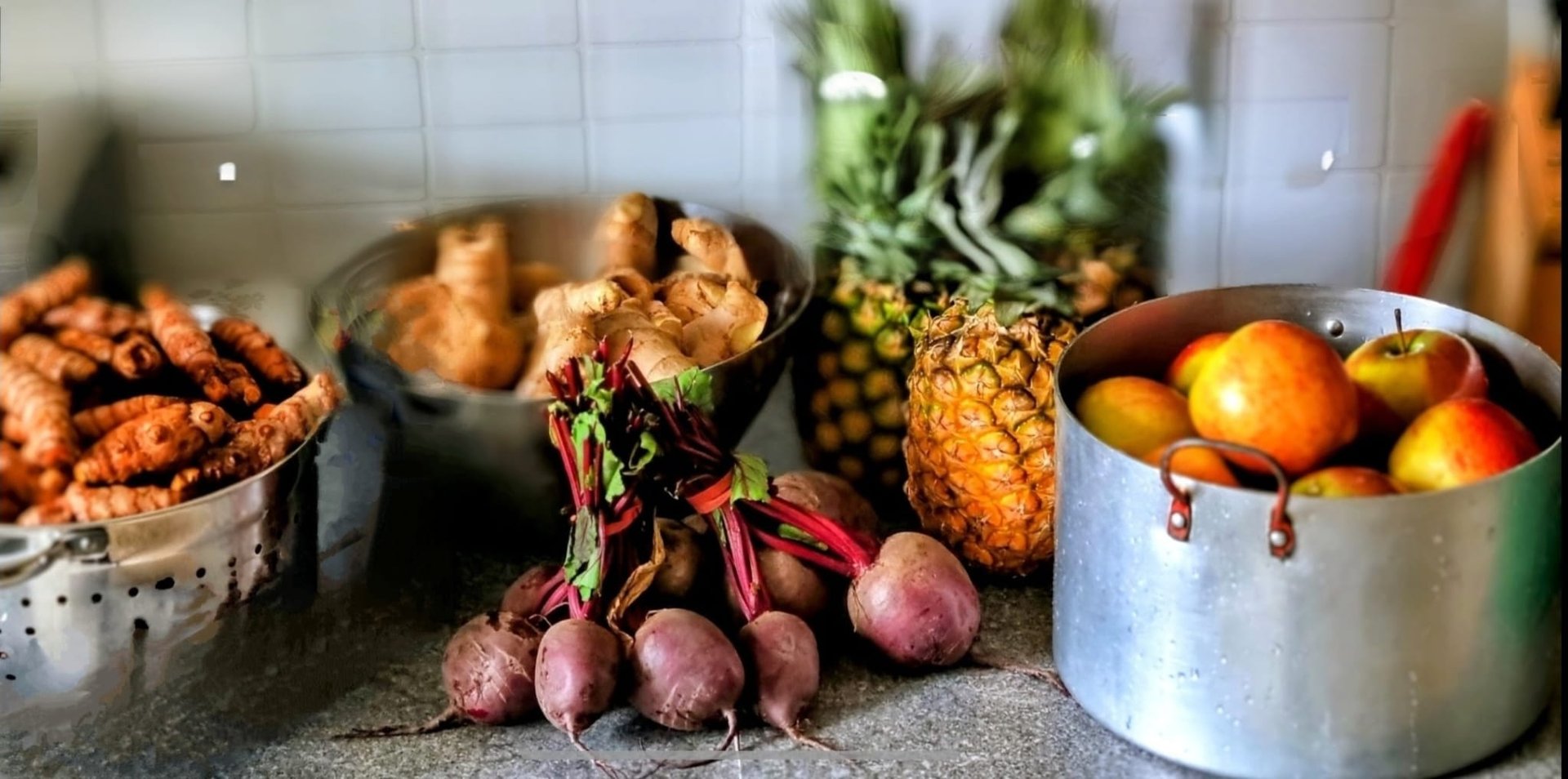 Raw natural ingredients for cold pressing by The Raw Root Co. Turmeric,Ginger,Apple,Beetroot and Pineapple