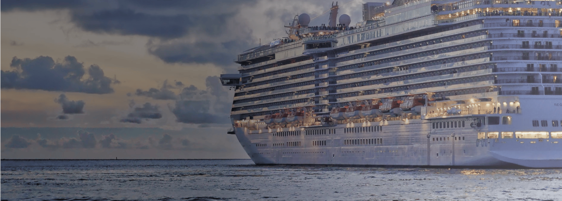an abstract photo of a curved building with a blue sky in the background